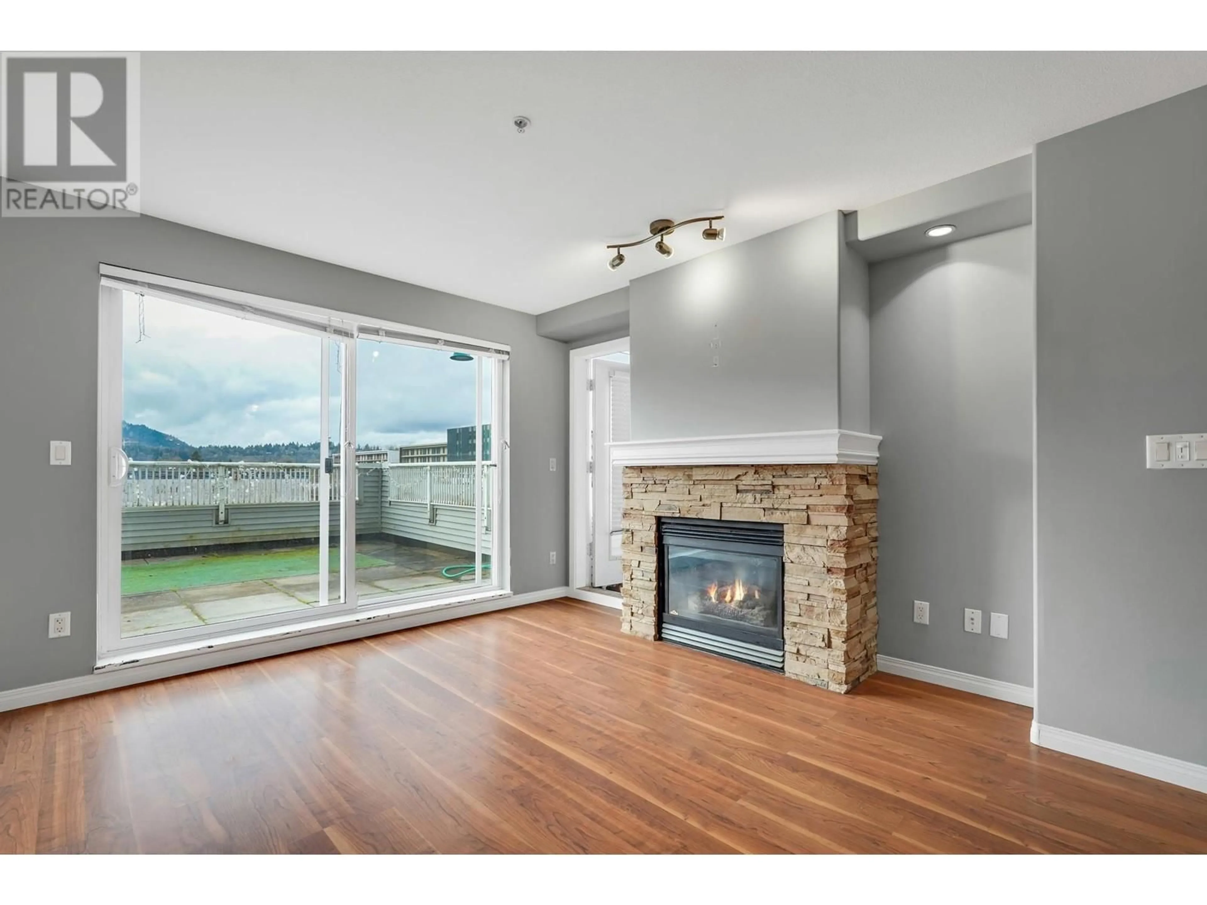 Living room with furniture, unknown for 212 - 3136 ST JOHNS STREET, Port Moody British Columbia V3H5E4