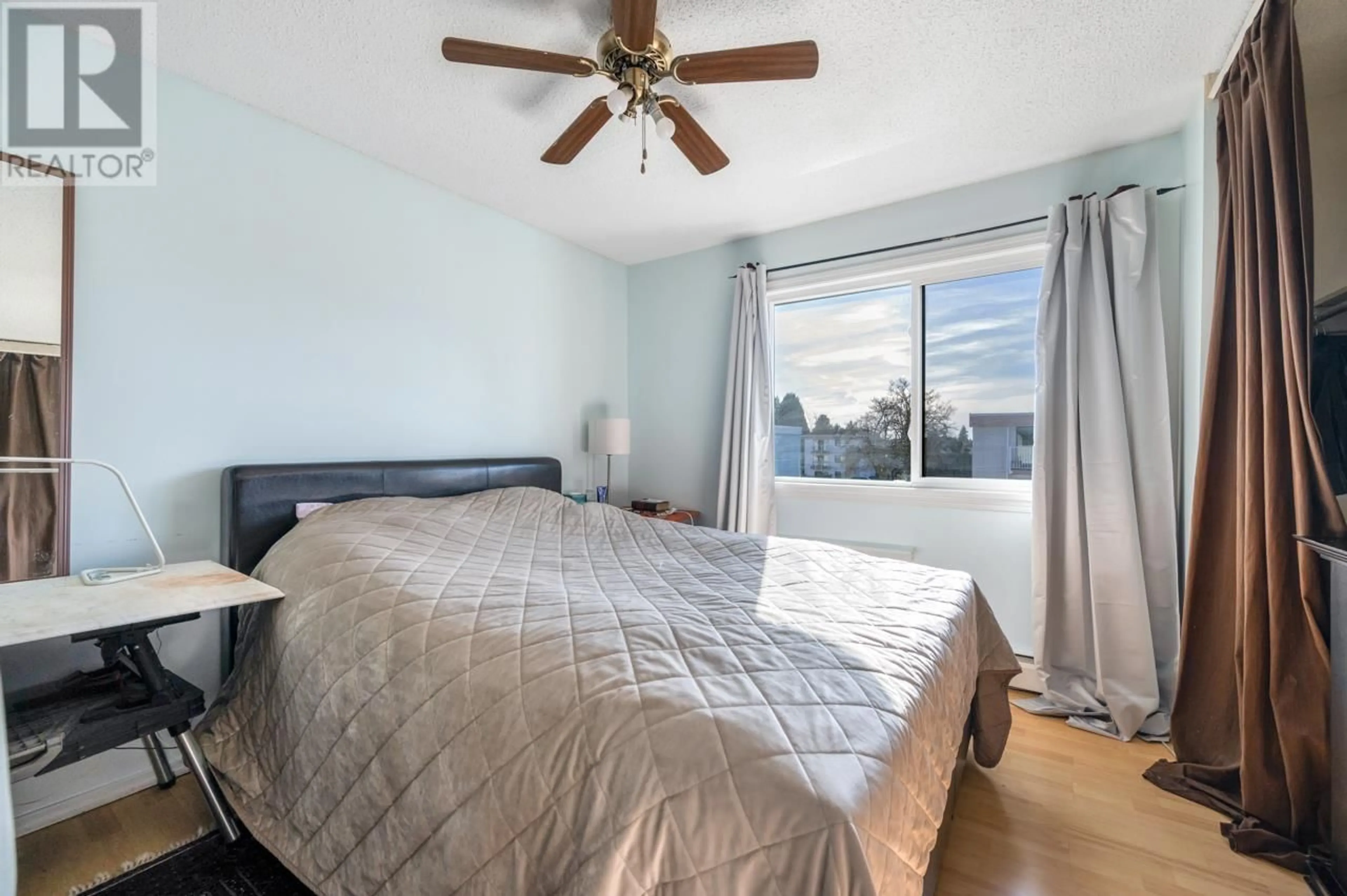 Bedroom with bed, wood/laminate floor for 302 7180 LINDSAY ROAD, Richmond British Columbia V7C3M6