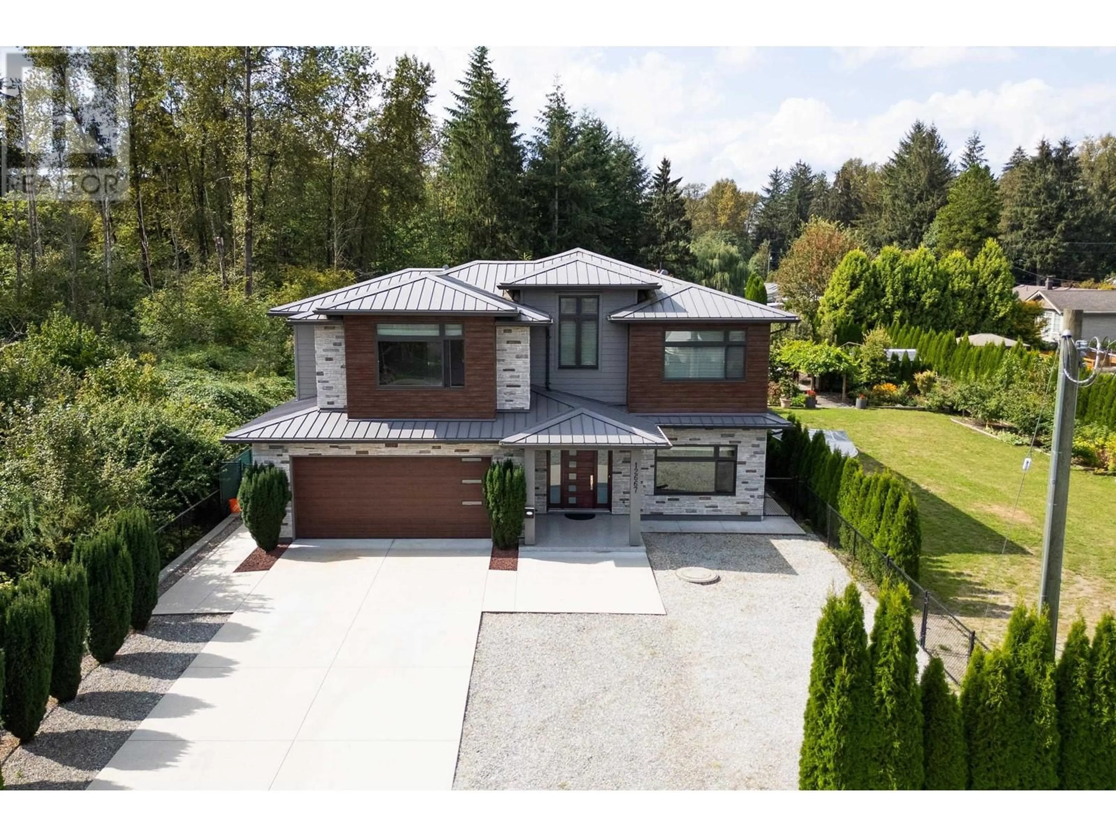 A pic from outside/outdoor area/front of a property/back of a property/a pic from drone, street for 12667 227 STREET, Maple Ridge British Columbia V2X6K4