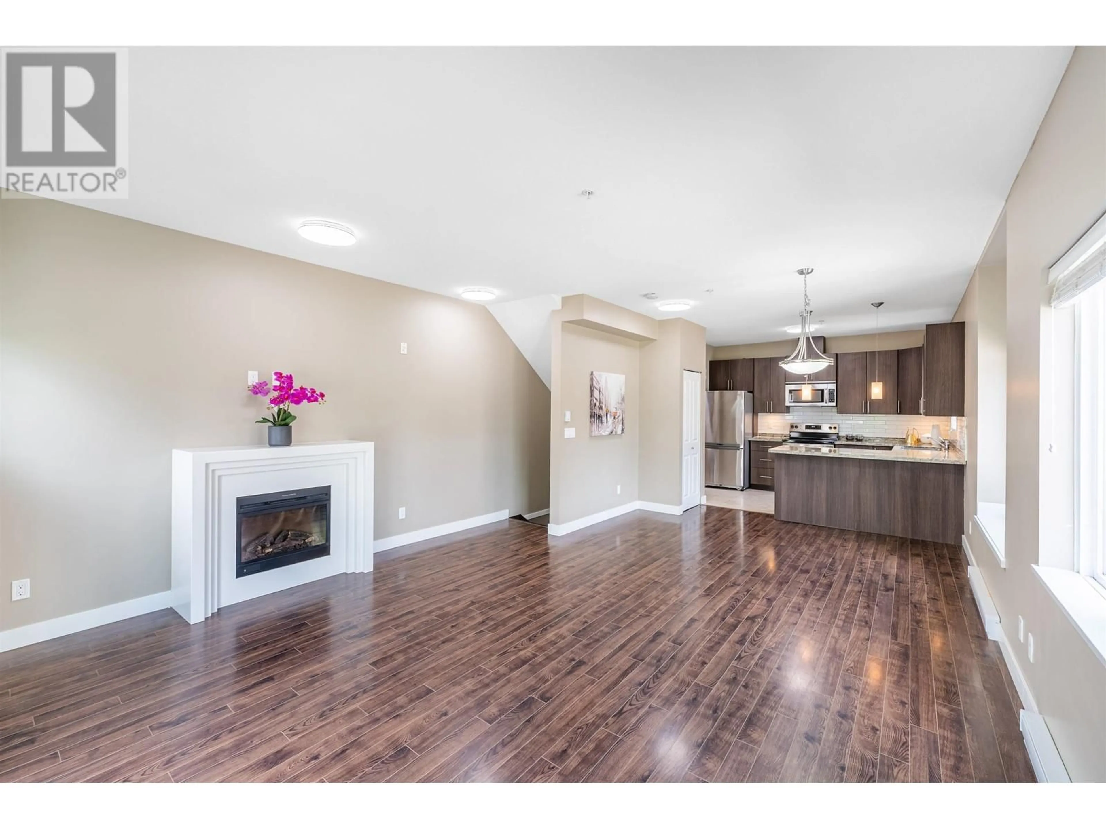 Open concept kitchen, wood/laminate floor for 208 - 3888 NORFOLK STREET, Burnaby British Columbia V5G1E5