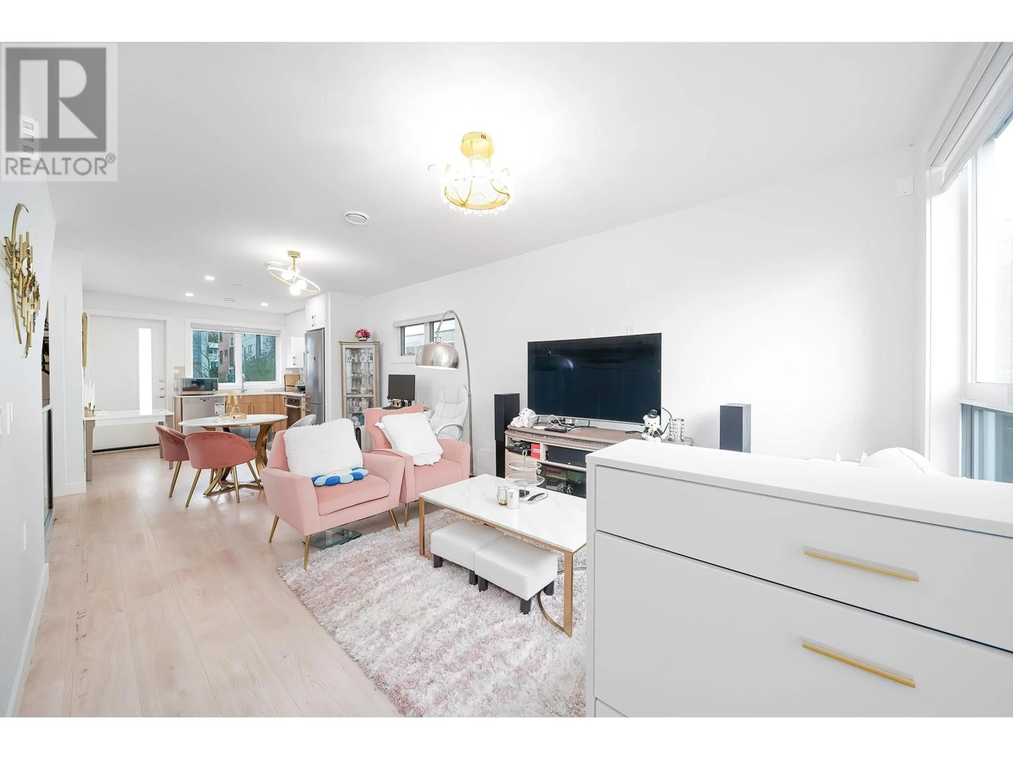 Living room with furniture, wood/laminate floor for 7871 FRENCH STREET, Vancouver British Columbia V6P4V8
