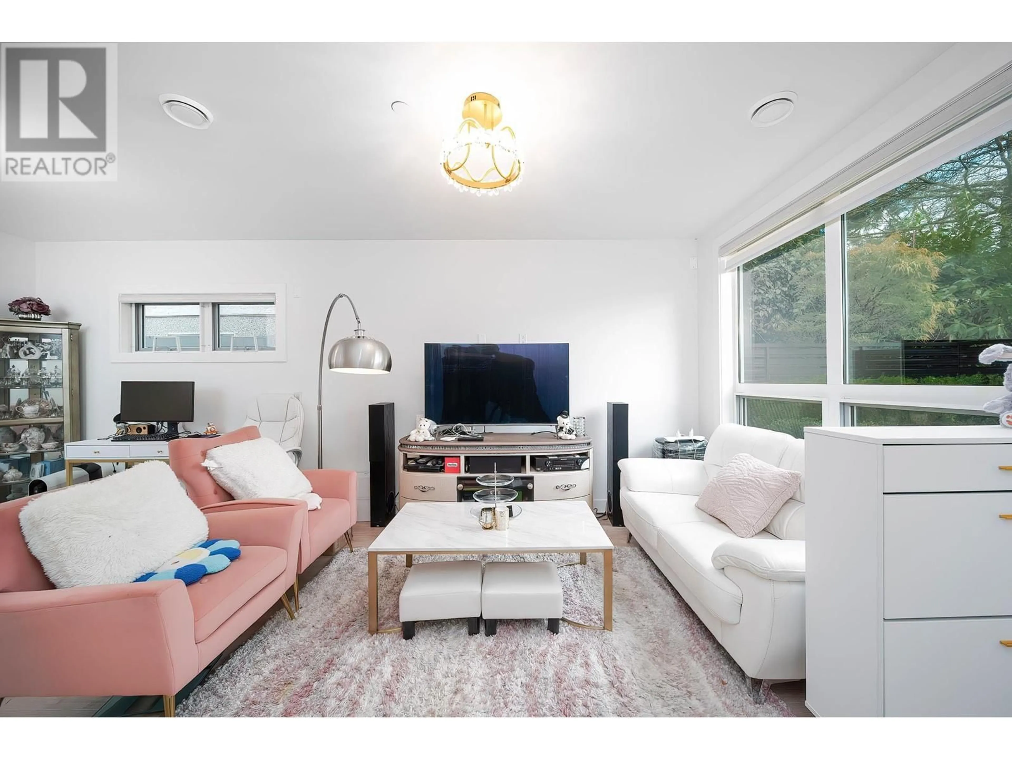 Living room with furniture, wood/laminate floor for 7871 FRENCH STREET, Vancouver British Columbia V6P4V8