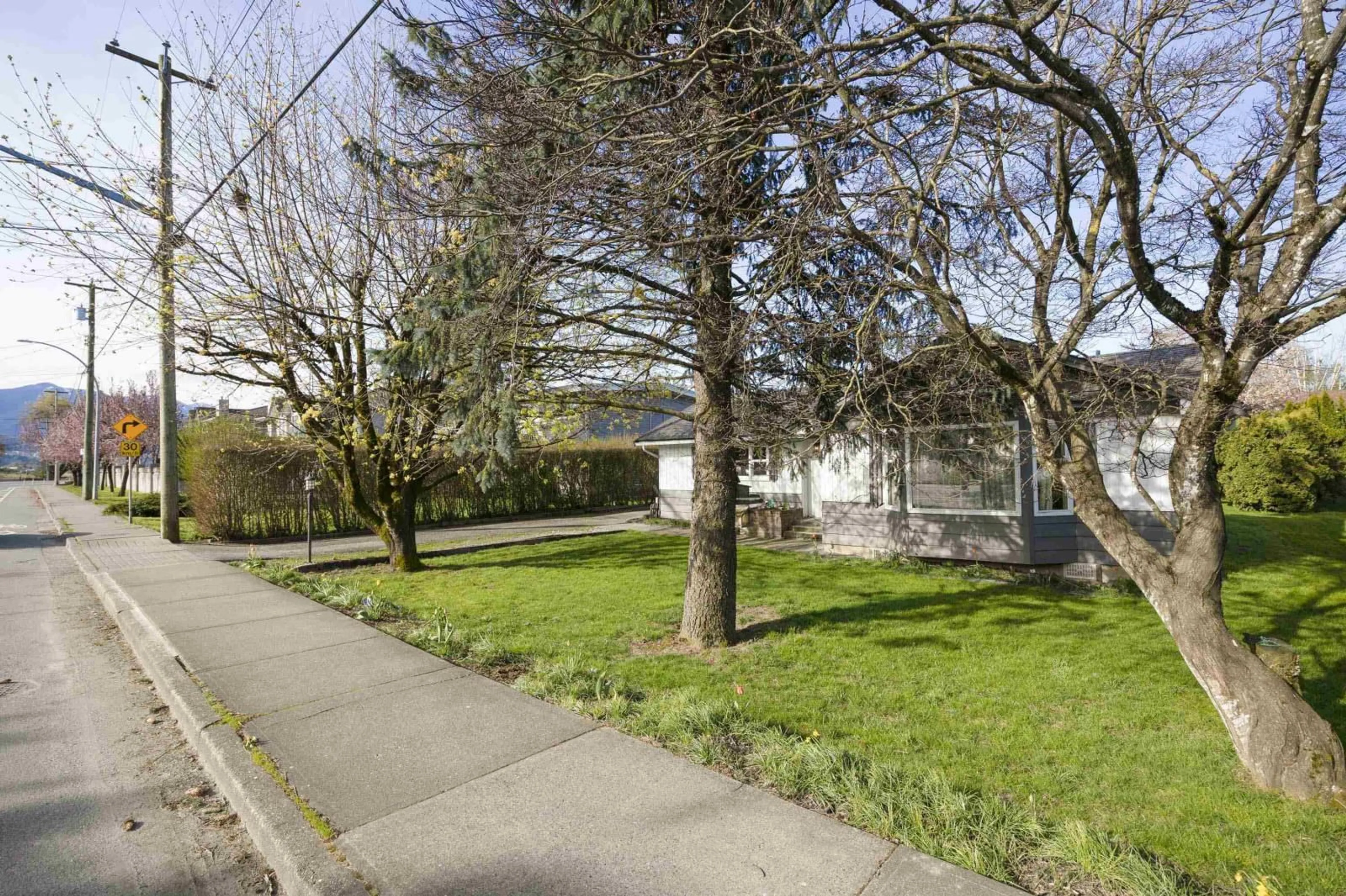 A pic from outside/outdoor area/front of a property/back of a property/a pic from drone, street for 8555 BROADWAY STREET|Chilliwack Proper S, Chilliwack British Columbia V2P5V4