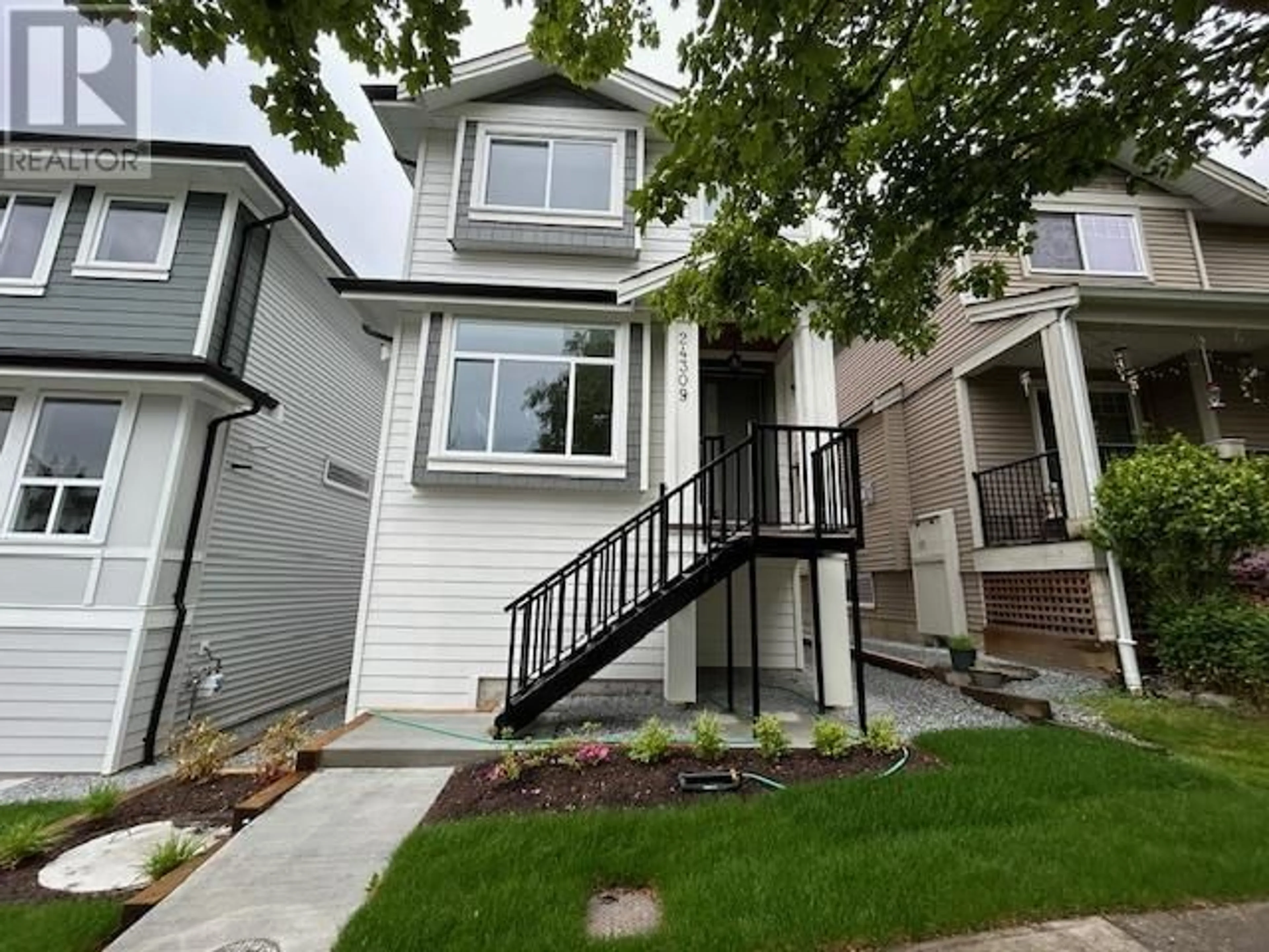 Home with vinyl exterior material, street for 24309 101A AVENUE, Maple Ridge British Columbia V2W0A7