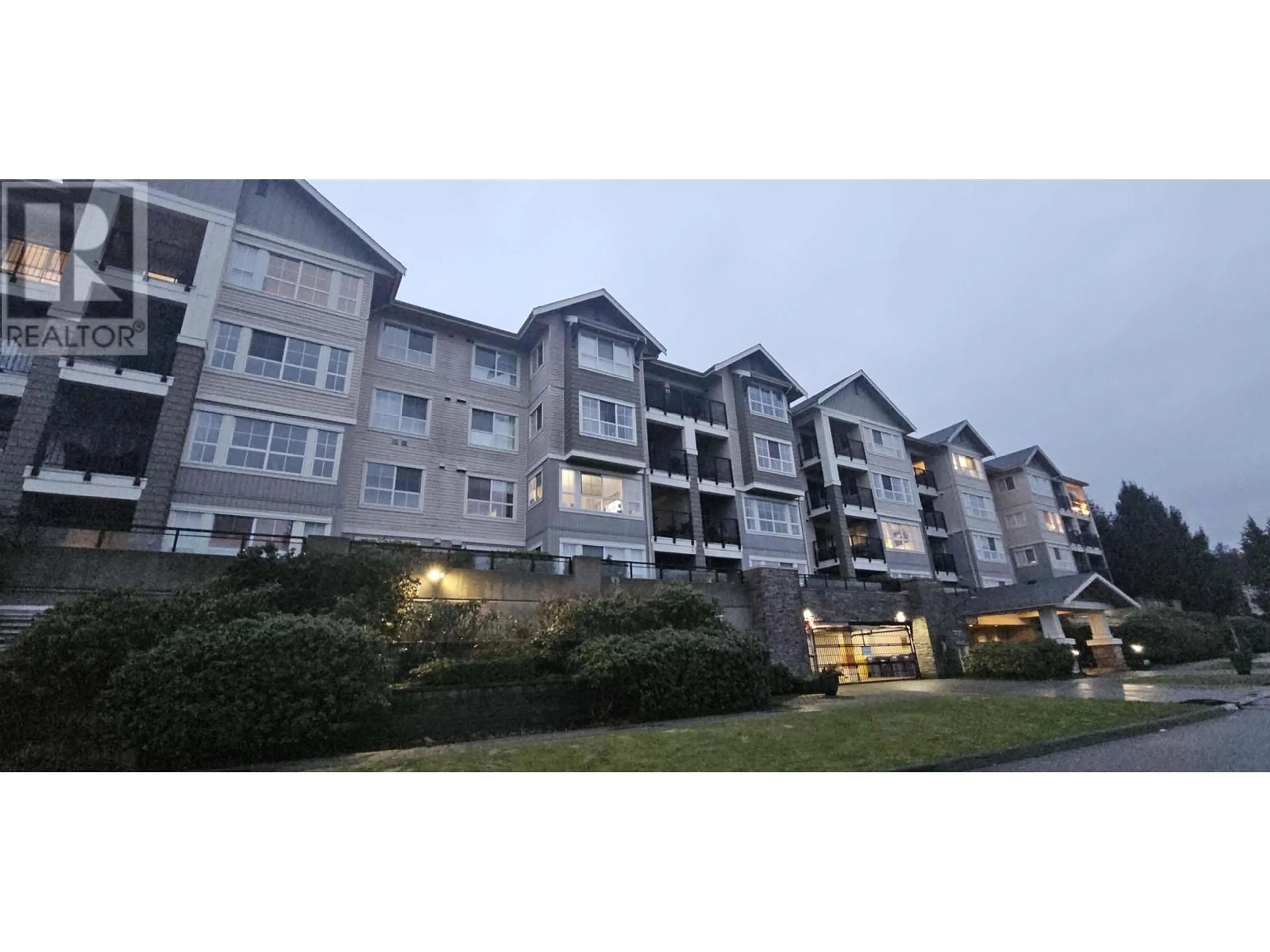 A pic from outside/outdoor area/front of a property/back of a property/a pic from drone, mountain view for 207 19673 MEADOW GARDENS WAY, Pitt Meadows British Columbia V3Y0A1