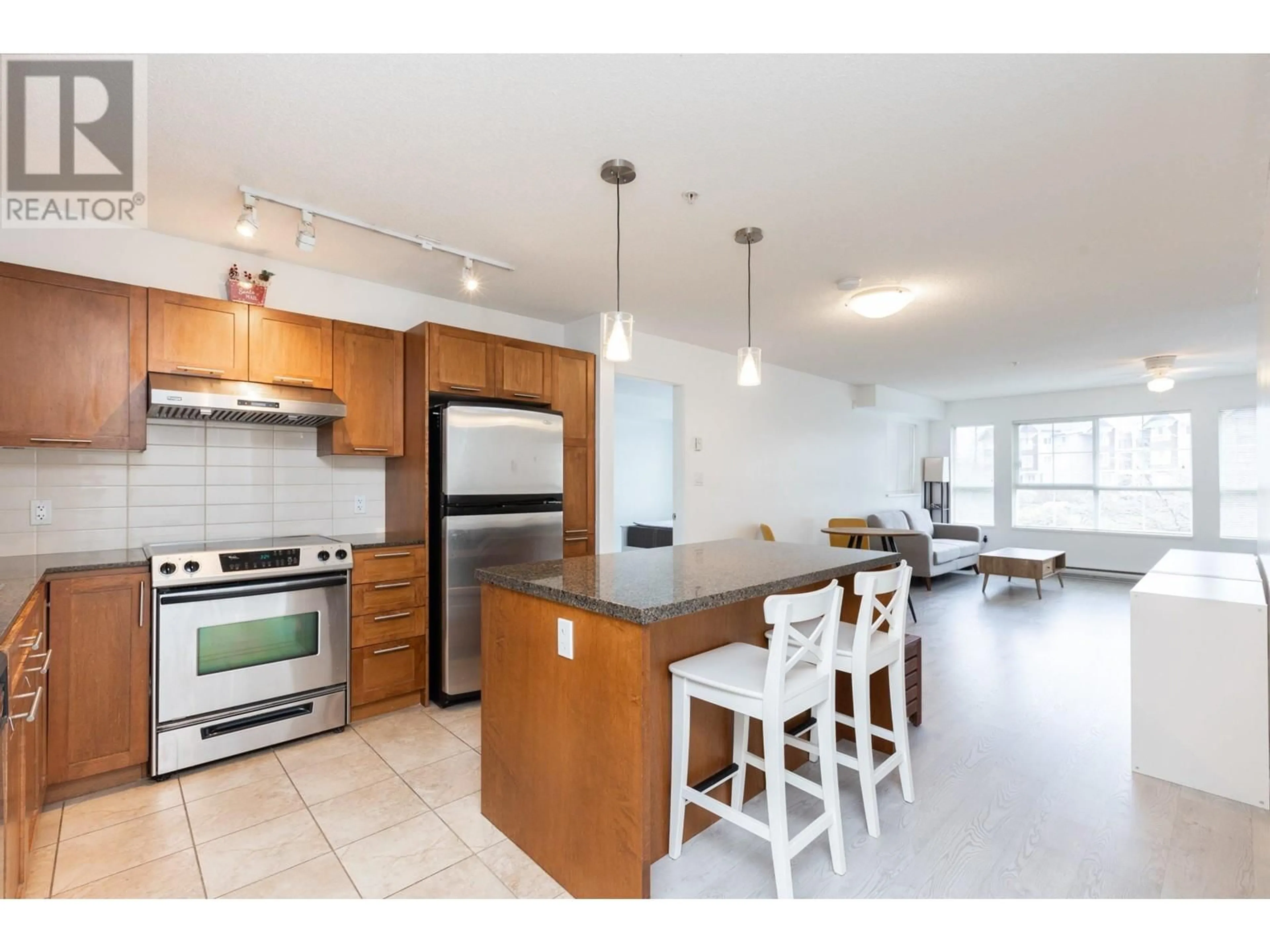 Open concept kitchen, unknown for 207 19673 MEADOW GARDENS WAY, Pitt Meadows British Columbia V3Y0A1