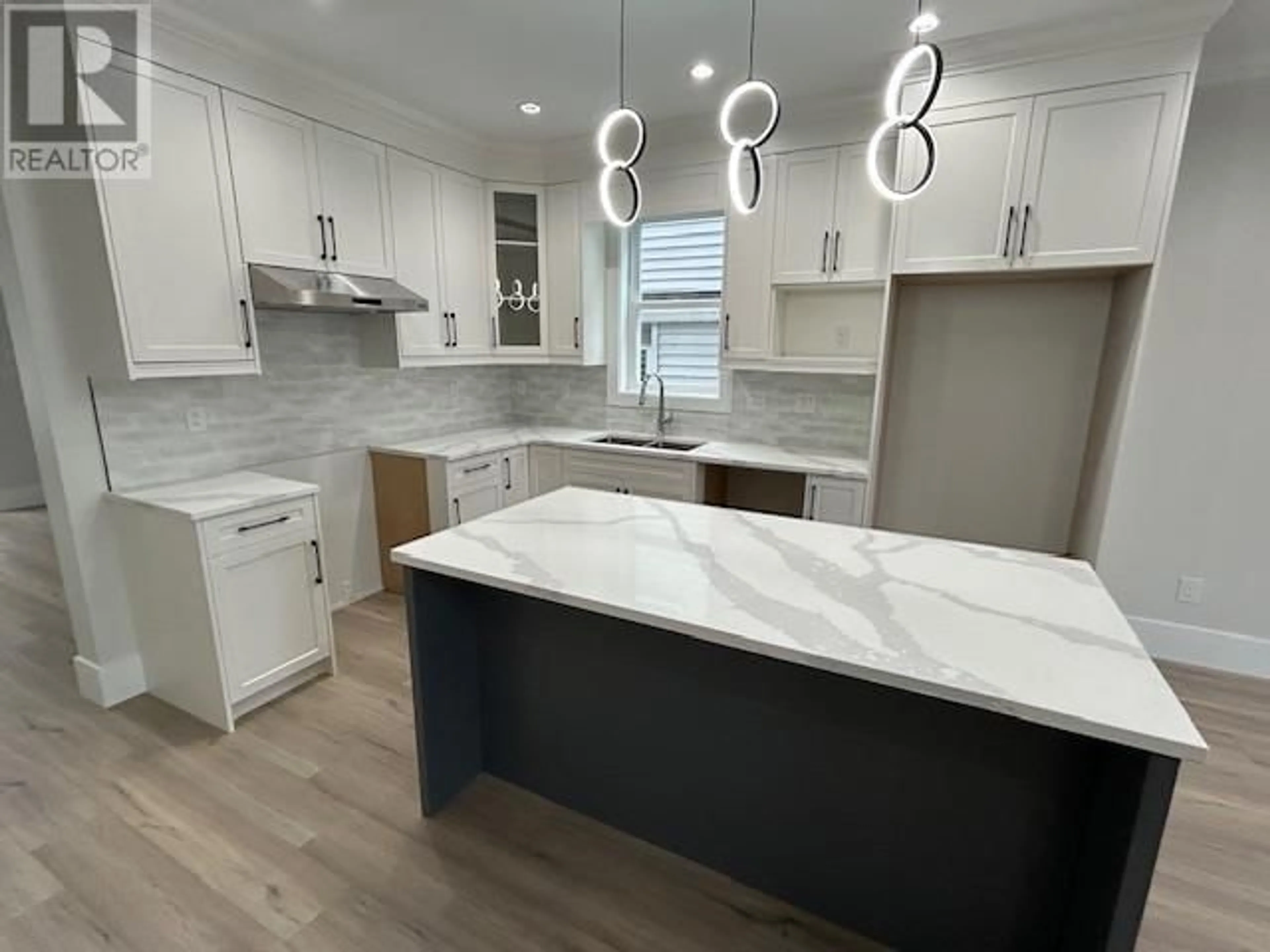 Open concept kitchen, ceramic/tile floor for 24307 101A AVENUE, Maple Ridge British Columbia V2W0A7