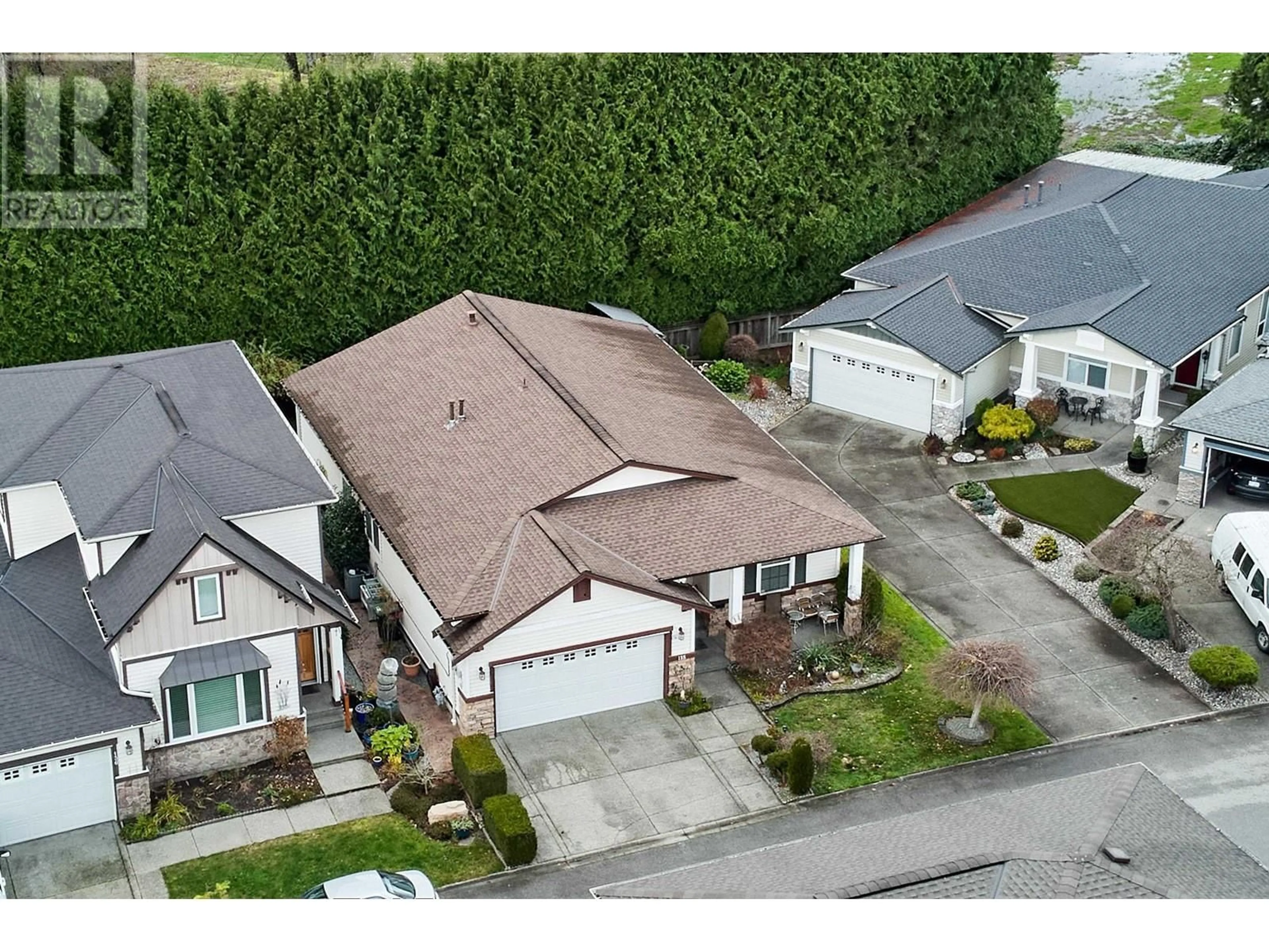 A pic from outside/outdoor area/front of a property/back of a property/a pic from drone, street for 135 - 19639 MEADOW GARDENS WAY, Pitt Meadows British Columbia V3Y2T5