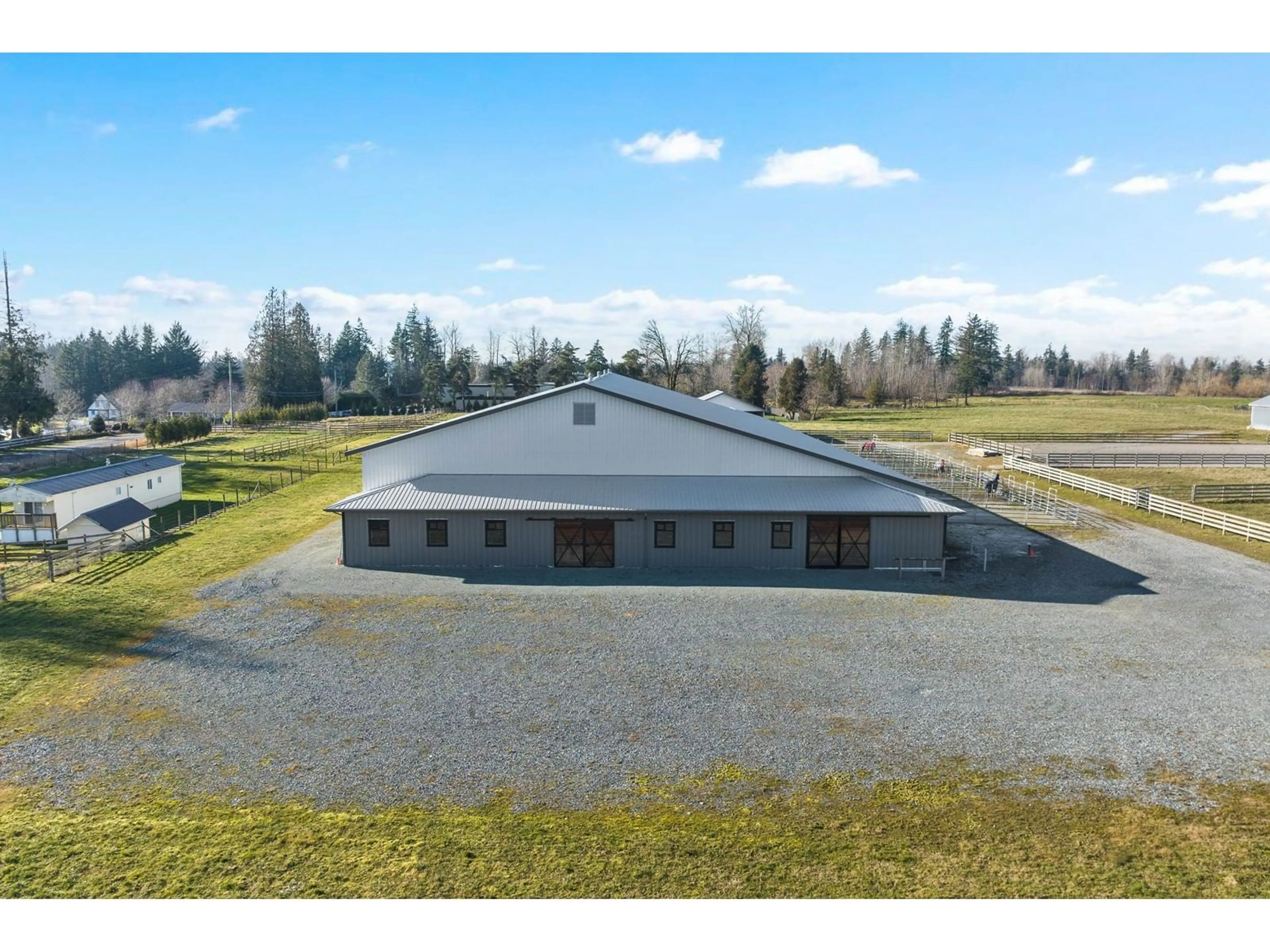 A pic from outside/outdoor area/front of a property/back of a property/a pic from drone, building for 2473 240, Langley British Columbia V2Z3B6