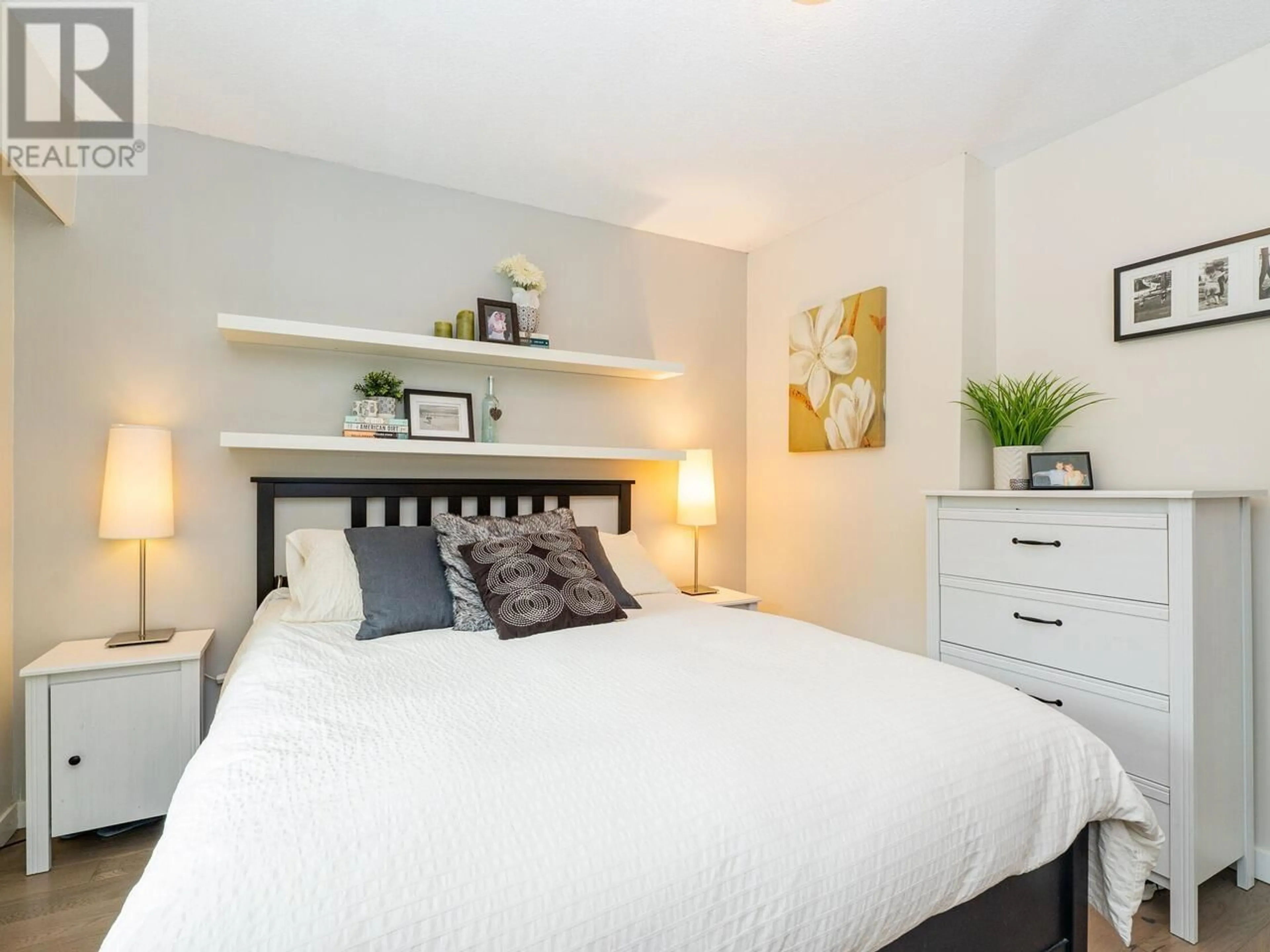 Bedroom with bed, wood/laminate floor for 3706 W KING EDWARD AVENUE, Vancouver British Columbia V6S1M7