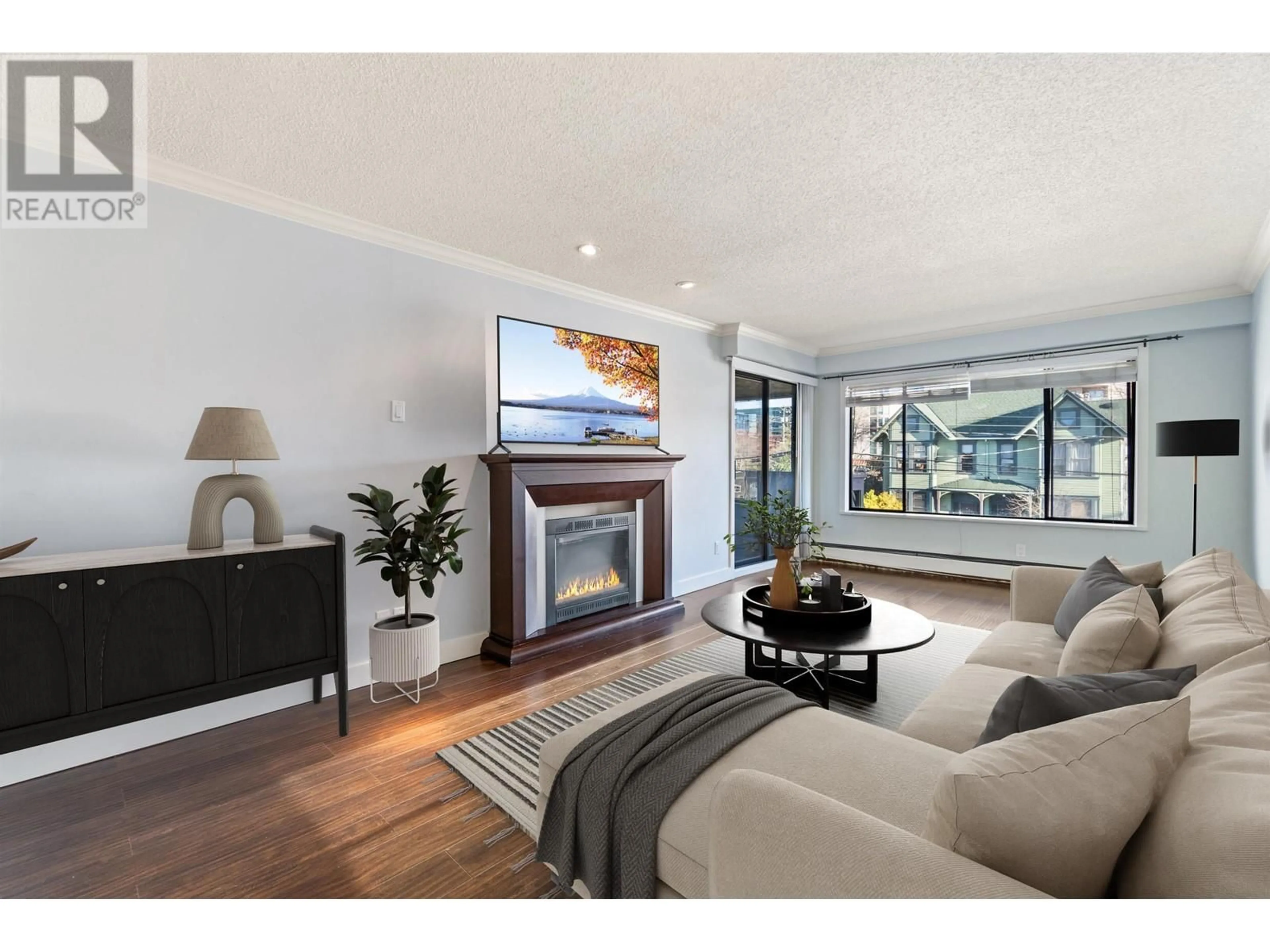 Living room with furniture, wood/laminate floor for 302 436 SEVENTH STREET, New Westminster British Columbia V3M3L3