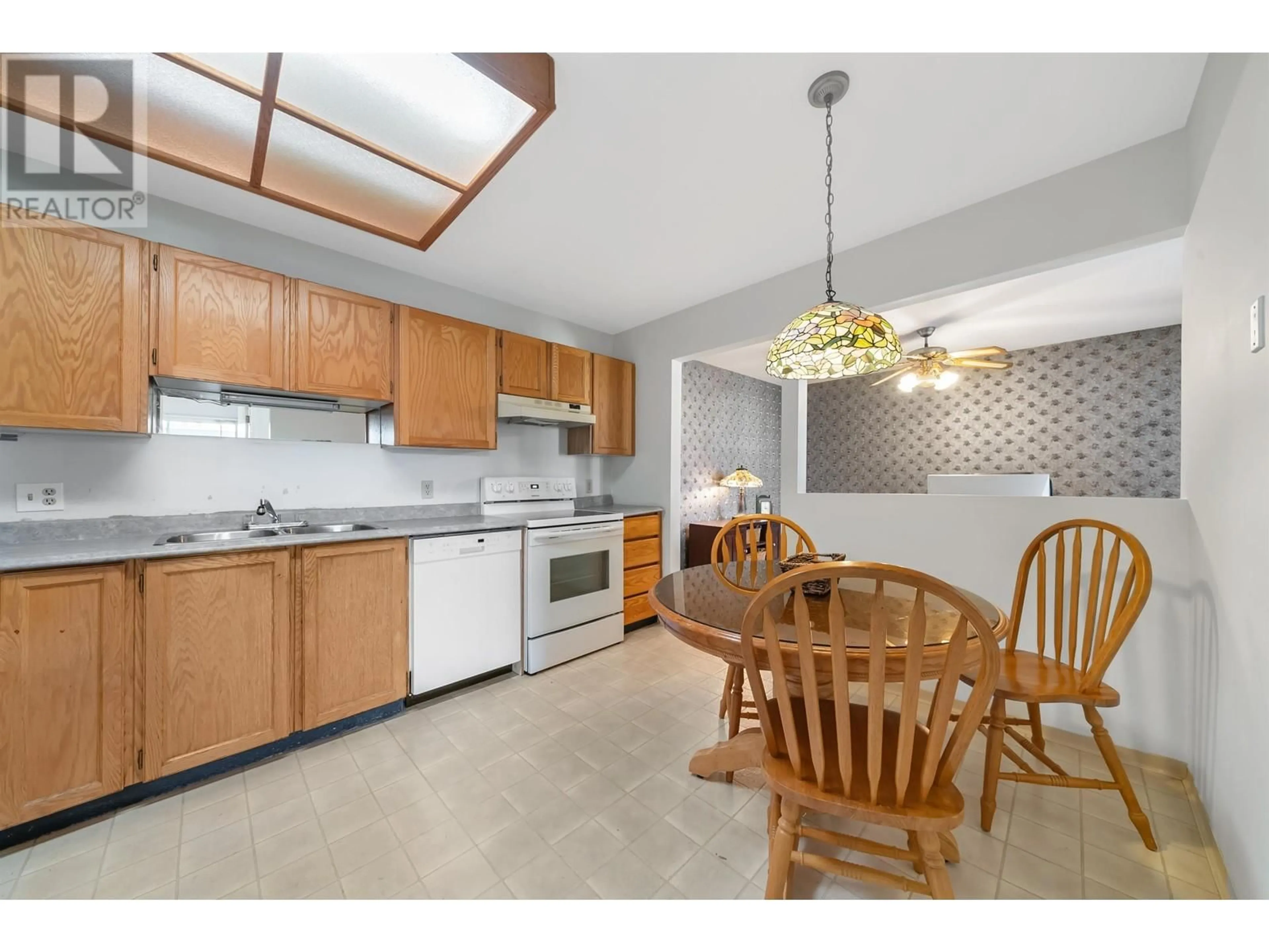 Standard kitchen, ceramic/tile floor for 202 22222 119 AVENUE, Maple Ridge British Columbia V2X2Y9