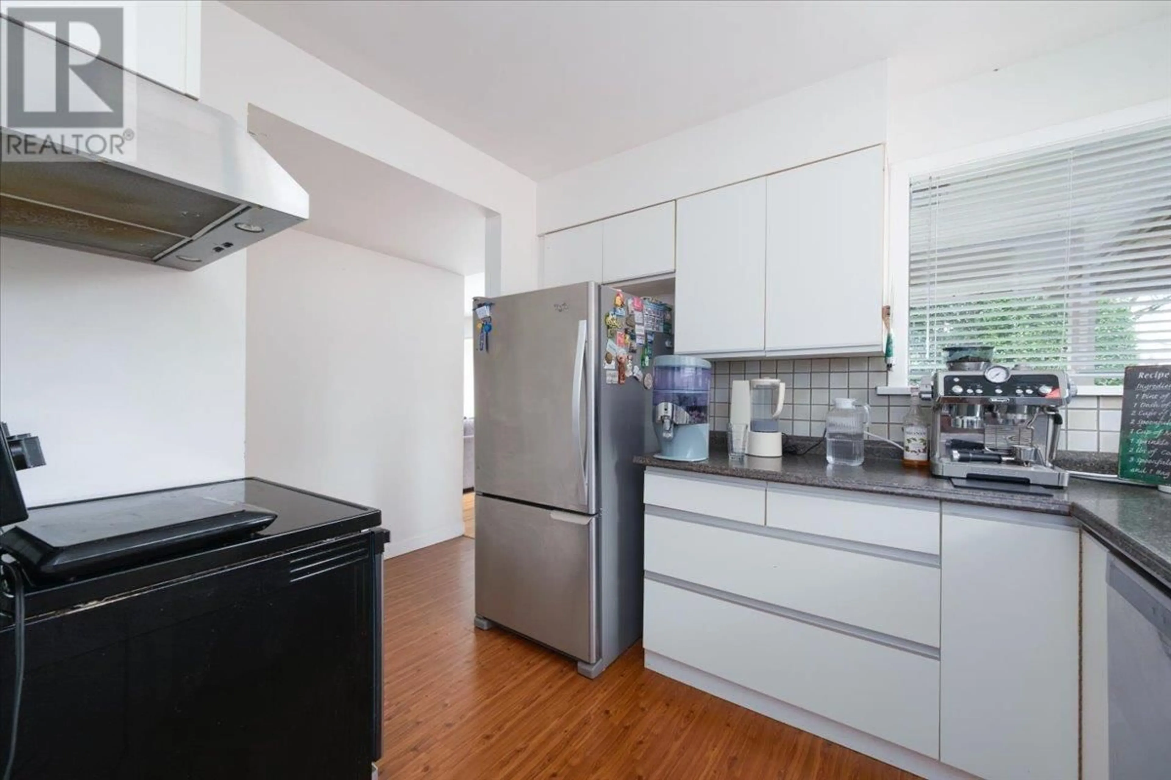 Standard kitchen, wood/laminate floor for 3001 PAISLEY ROAD, North Vancouver British Columbia V7R1C7