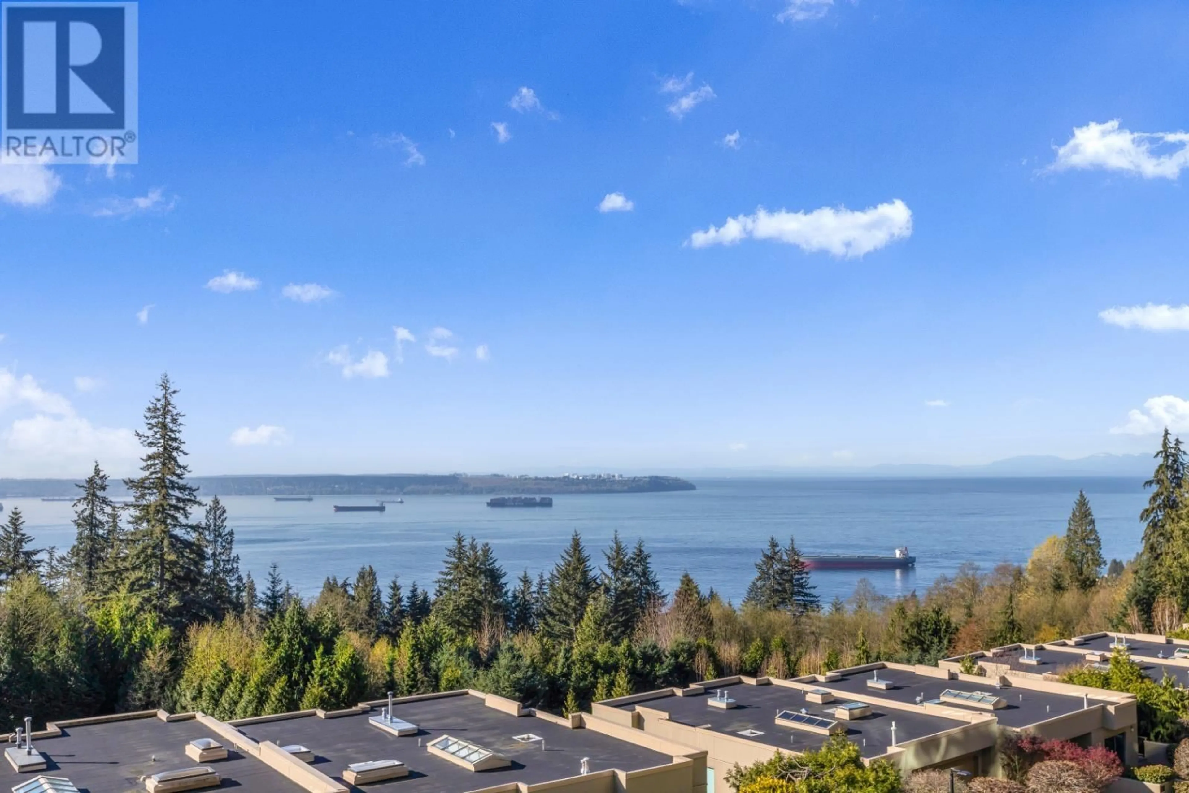 A pic from outside/outdoor area/front of a property/back of a property/a pic from drone, water/lake/river/ocean view for 403 3131 DEER RIDGE DRIVE, West Vancouver British Columbia V7S4W1