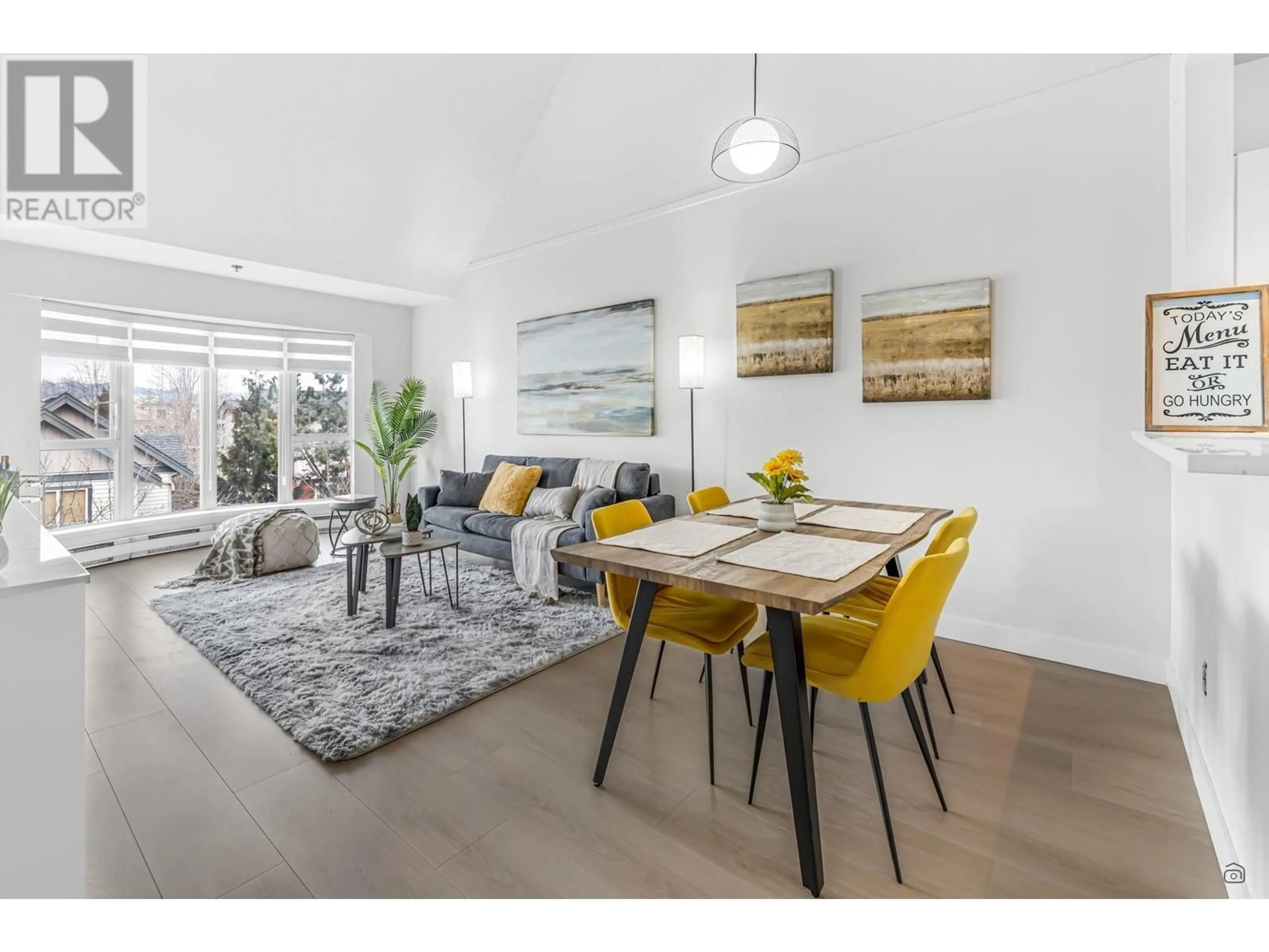 Living room with furniture, wood/laminate floor for 308 7700 ST. ALBANS ROAD, Richmond British Columbia V6Y3Y4