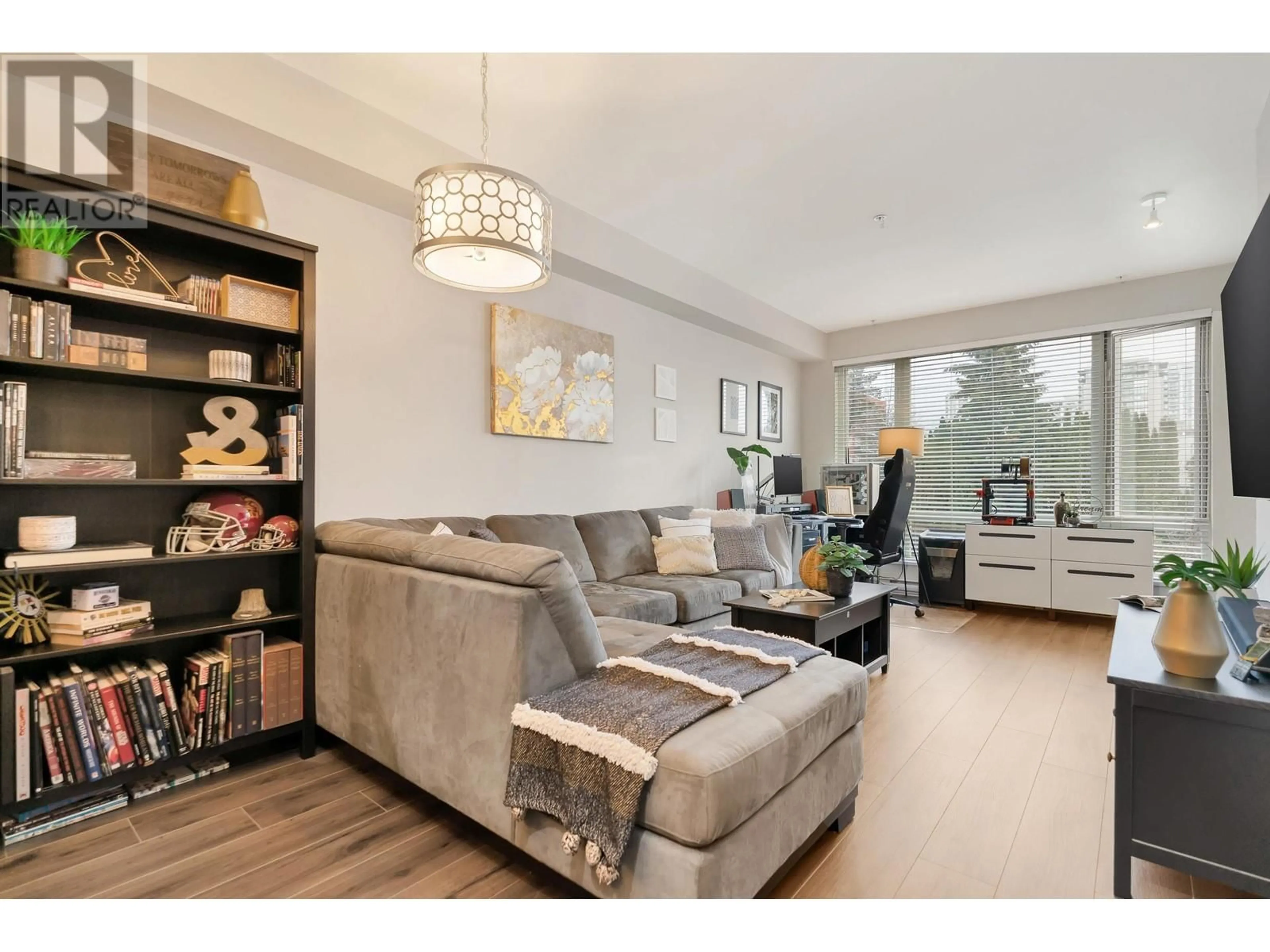 Living room with furniture, wood/laminate floor for 203 - 1188 JOHNSON STREET, Coquitlam British Columbia V3B0H7