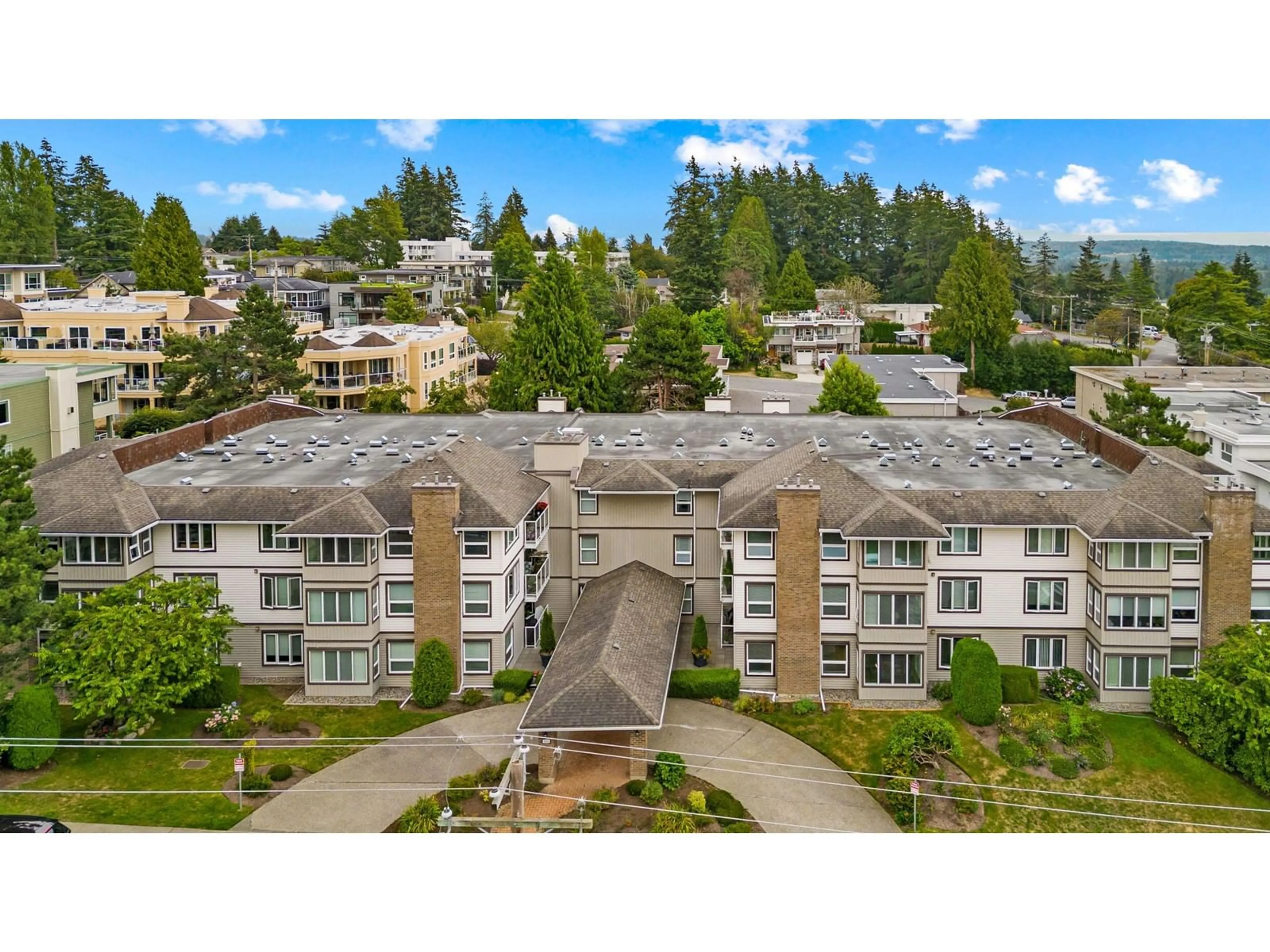 A pic from outside/outdoor area/front of a property/back of a property/a pic from drone, mountain view for 303 - 1234 MERKLIN, White Rock British Columbia V4B4B9