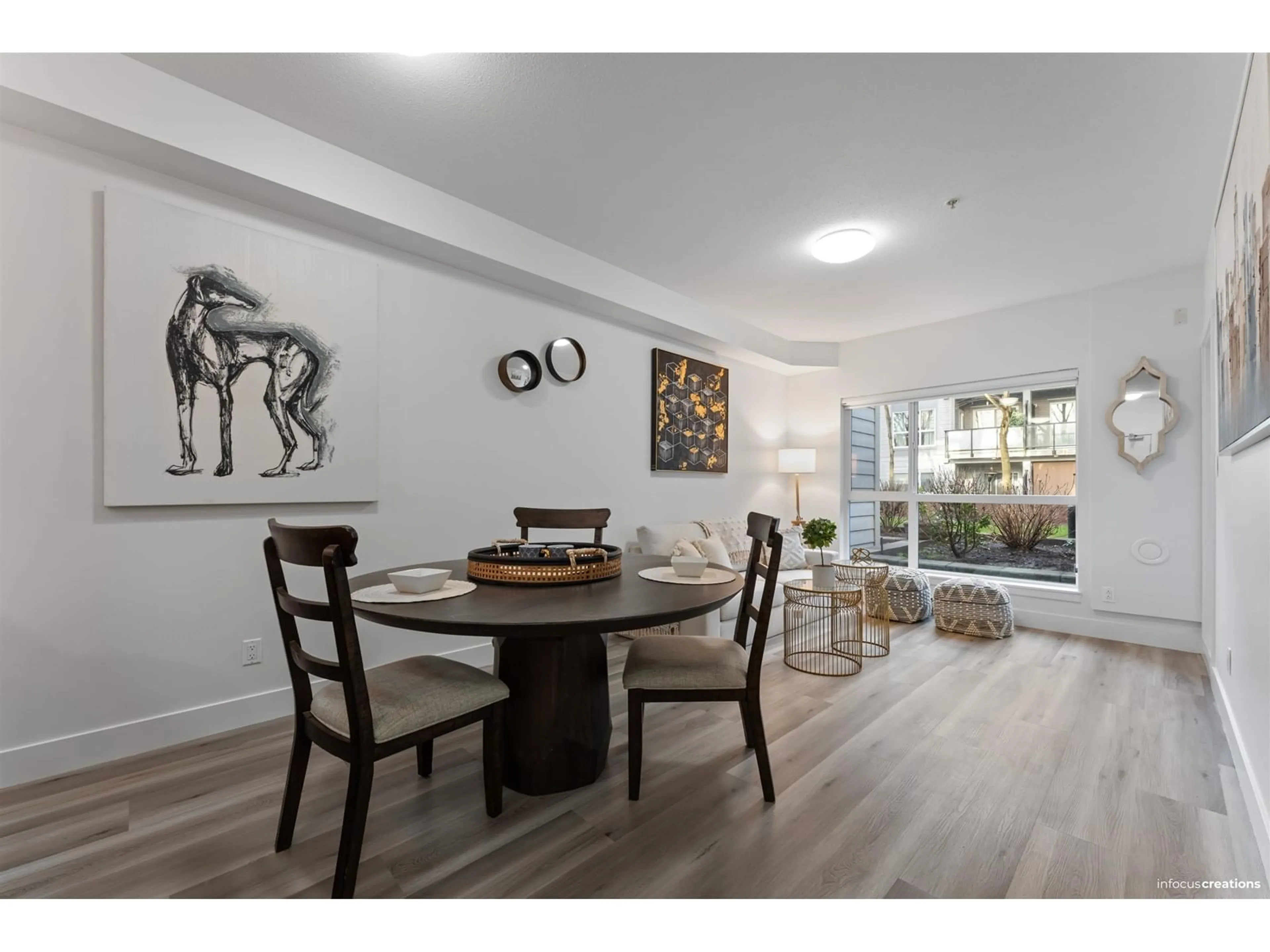 Dining room, wood/laminate floor for 220 13733 107A AVENUE, Surrey British Columbia V3T0B7