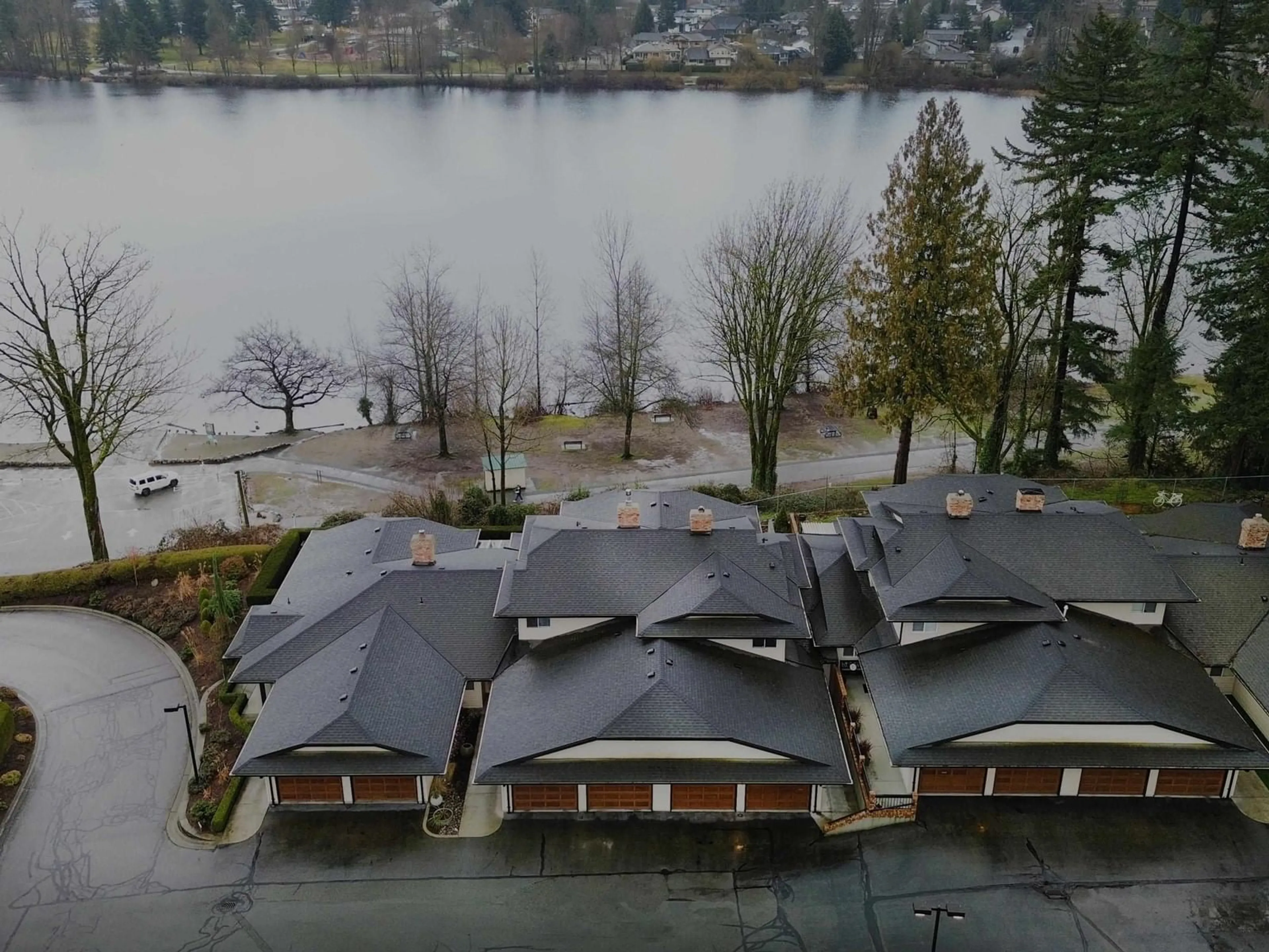 A pic from outside/outdoor area/front of a property/back of a property/a pic from drone, water/lake/river/ocean view for 4 - 32890 MILL LAKE, Abbotsford British Columbia V2S8G5