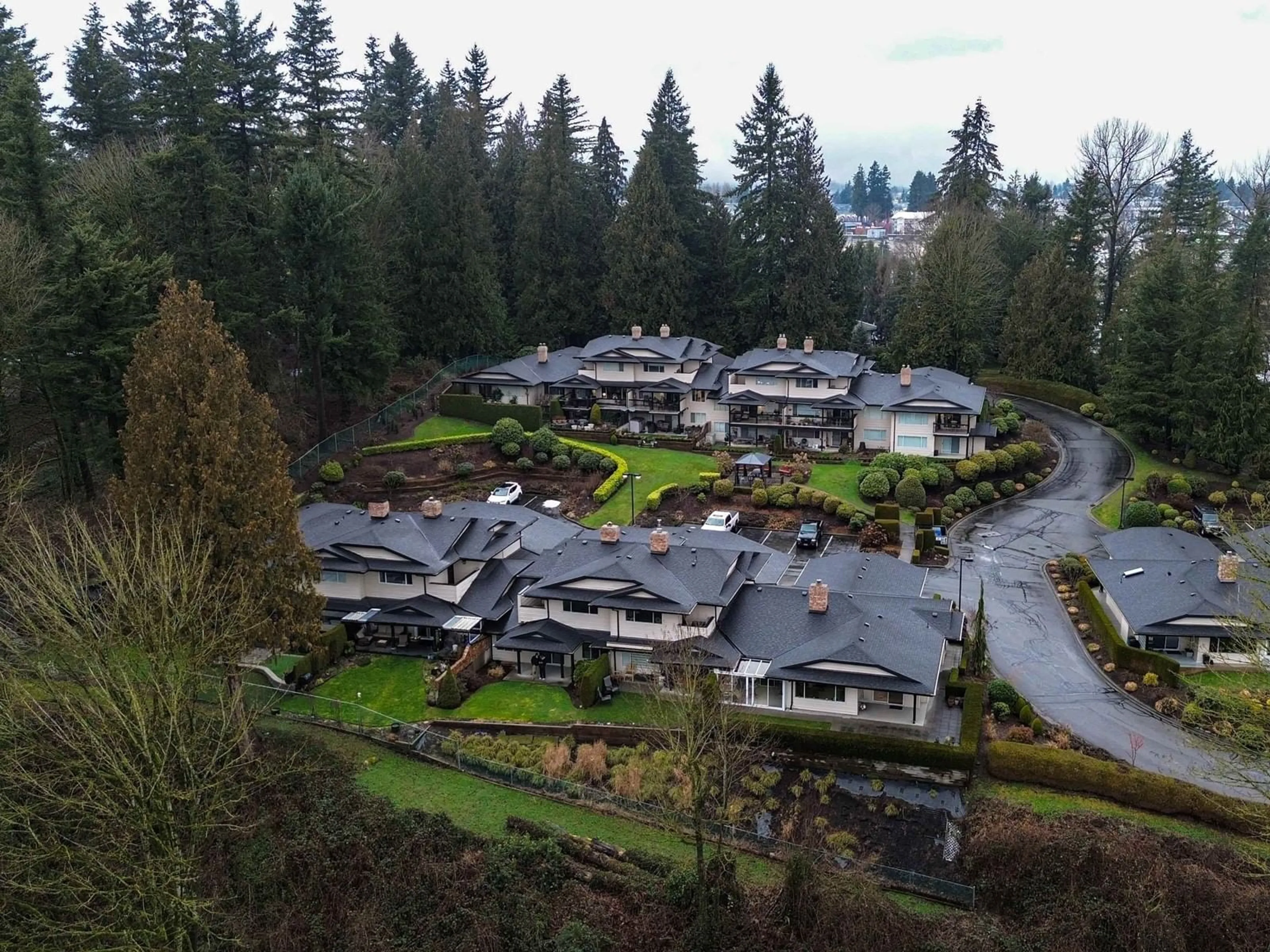 A pic from outside/outdoor area/front of a property/back of a property/a pic from drone, mountain view for 4 - 32890 MILL LAKE, Abbotsford British Columbia V2S8G5