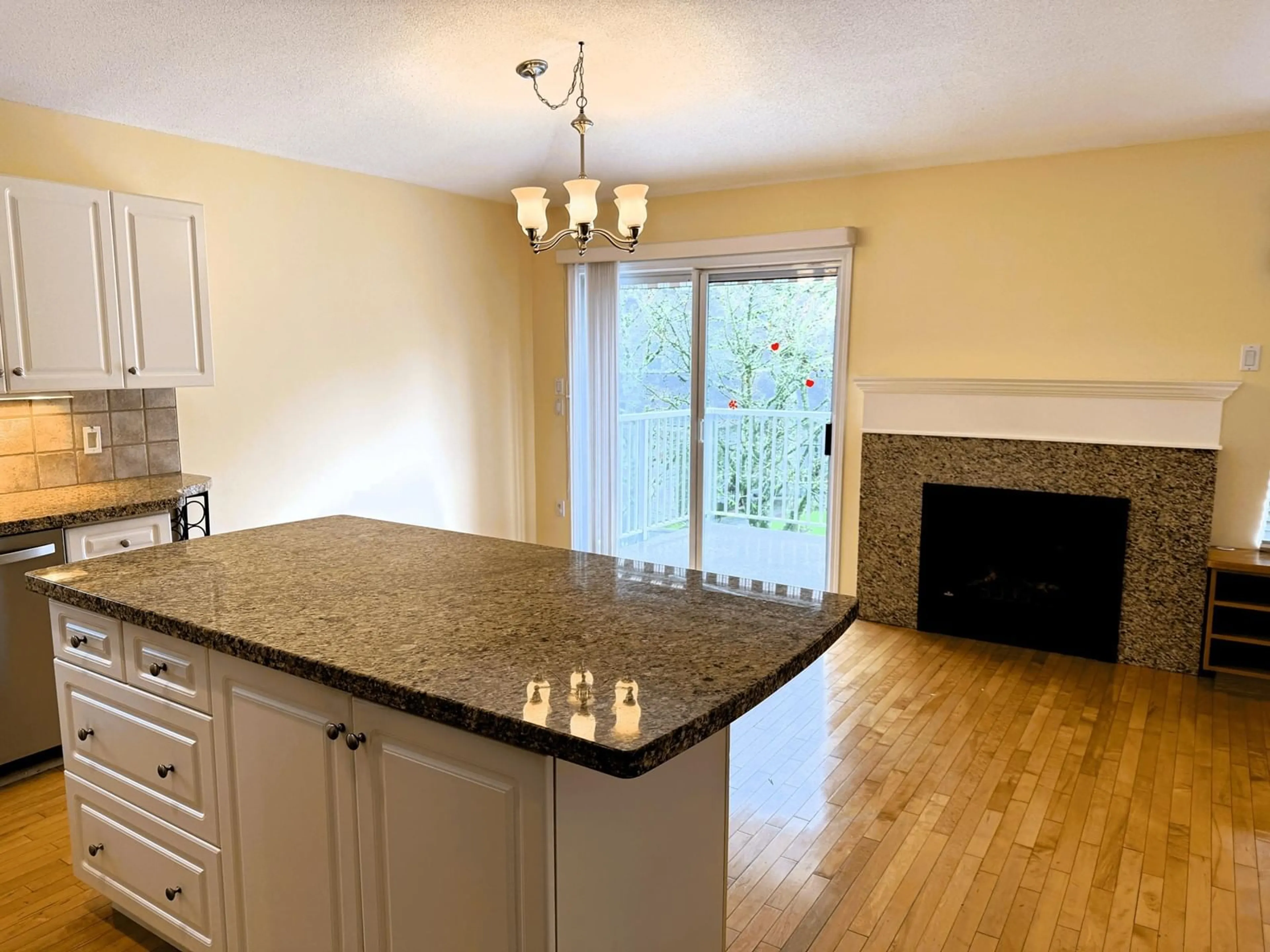 Open concept kitchen, wood/laminate floor for 11 16888 80 AVENUE, Surrey British Columbia V4N5A1