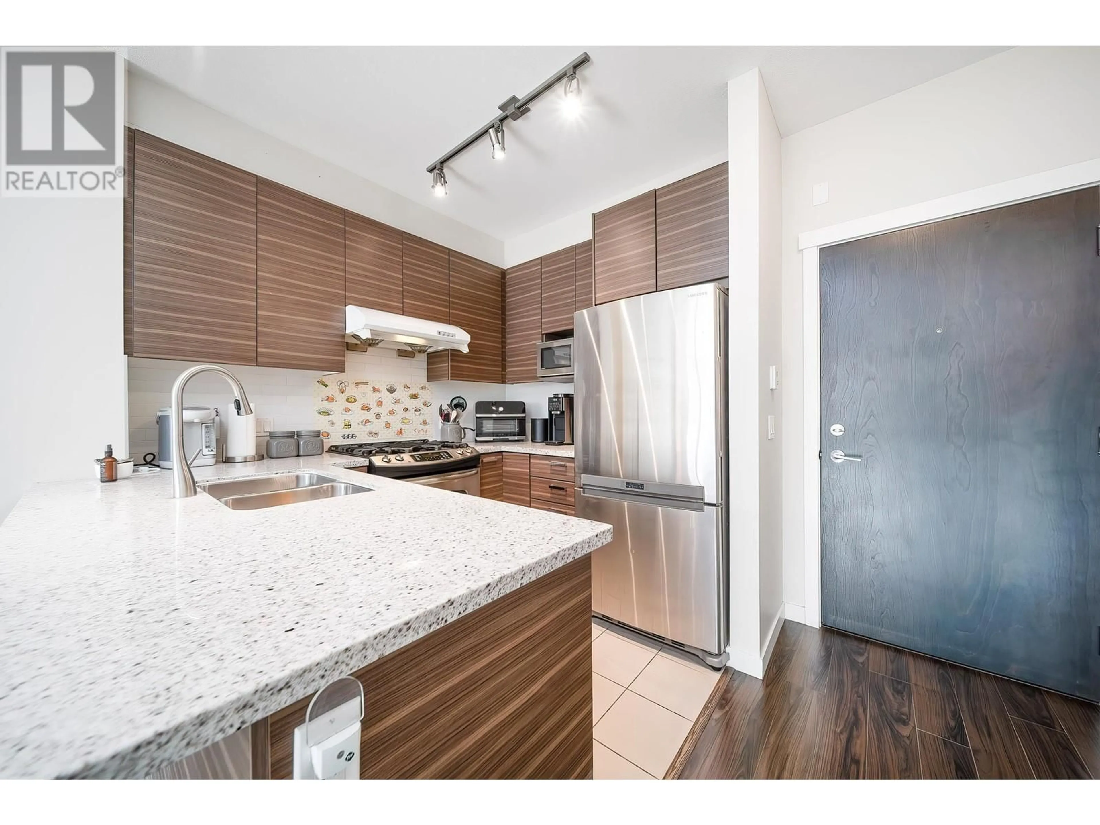 Open concept kitchen, unknown for 317 9388 MCKIM WAY, Richmond British Columbia V6X0J7