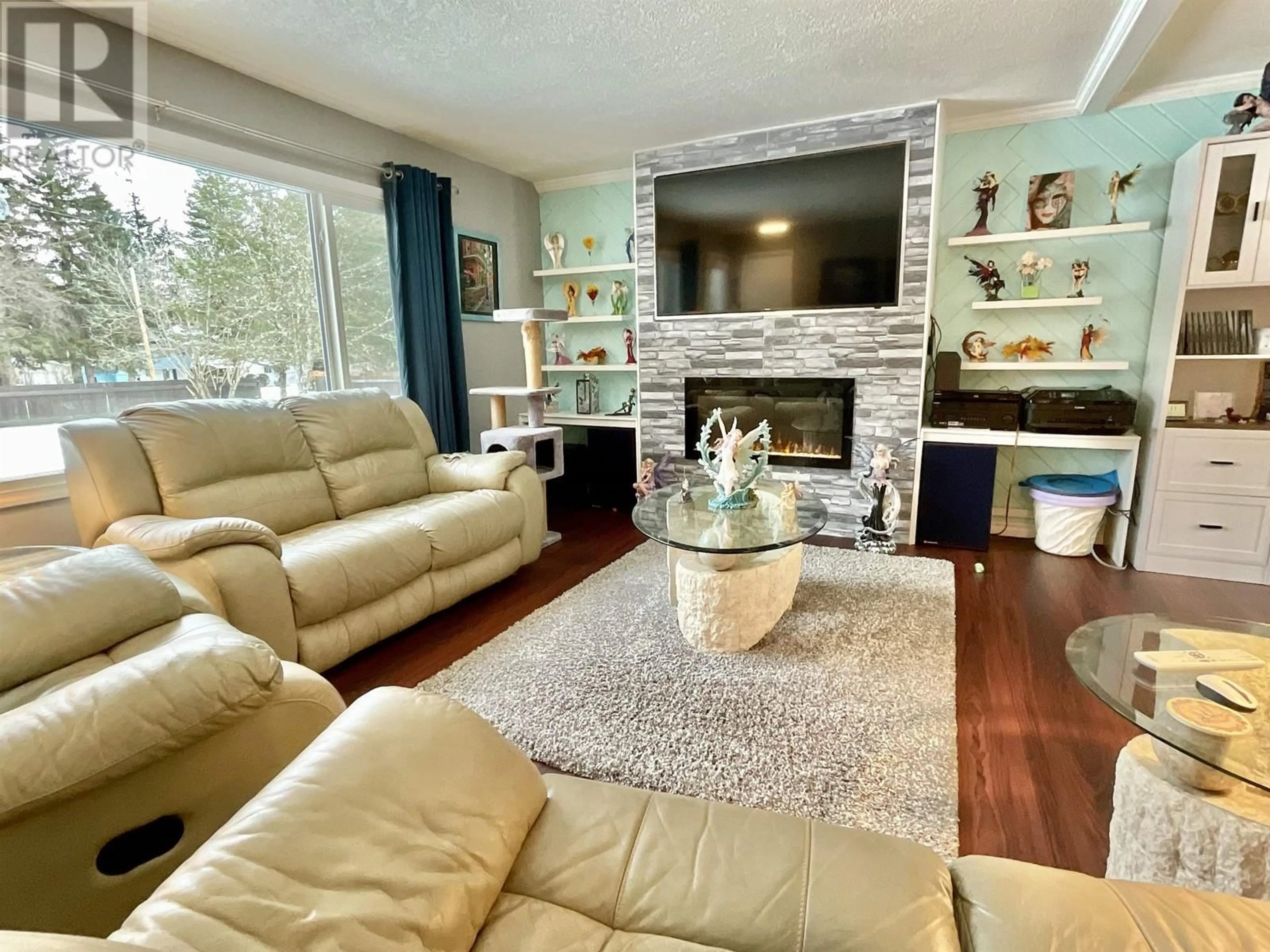 Living room with furniture, wood/laminate floor for 3070 RED BLUFF ROAD, Quesnel British Columbia V2J6C6