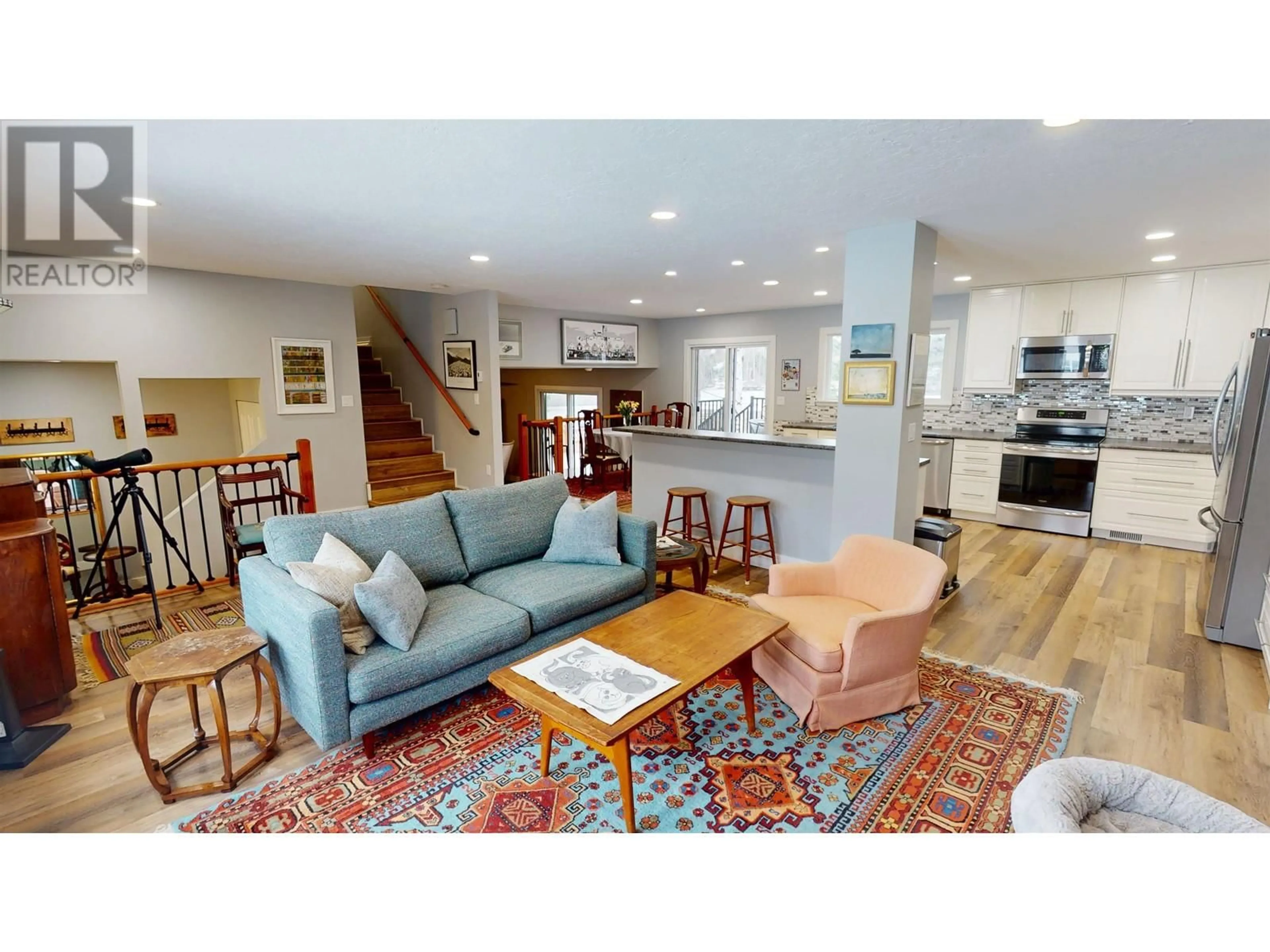 Living room with furniture, wood/laminate floor for 872 FUNN STREET, Quesnel British Columbia V2J4Y8