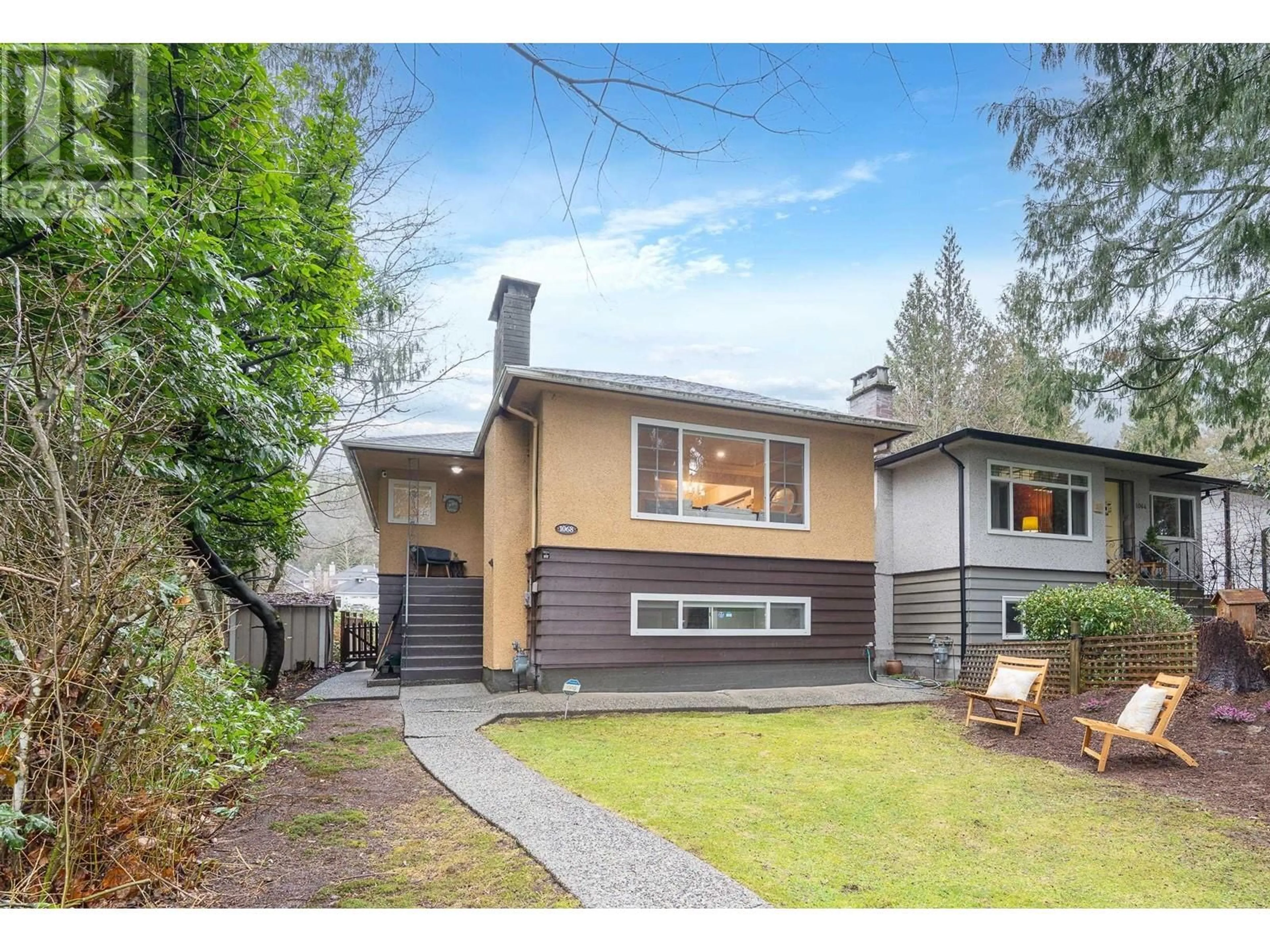 Home with vinyl exterior material, street for 1068 CANYON BOULEVARD, North Vancouver British Columbia V7R2K4