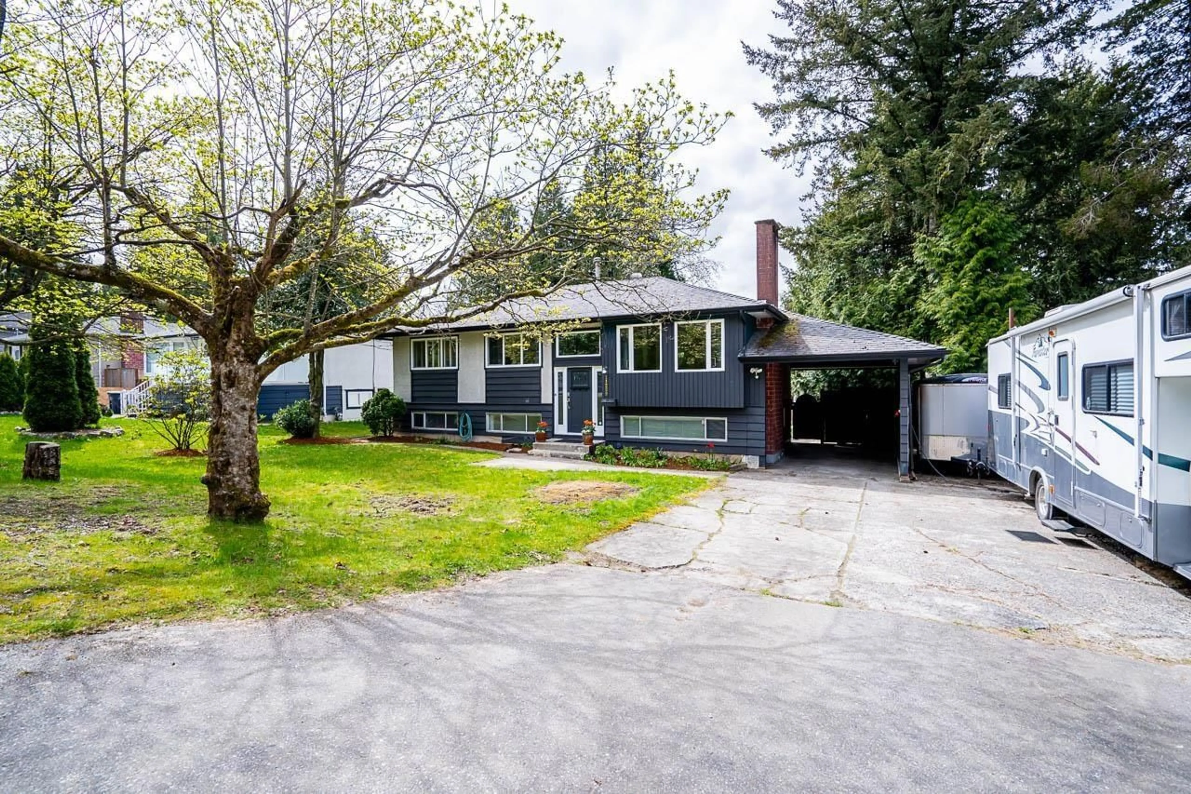 A pic from outside/outdoor area/front of a property/back of a property/a pic from drone, street for 11299 150TH STREET, Surrey British Columbia V3R4E1