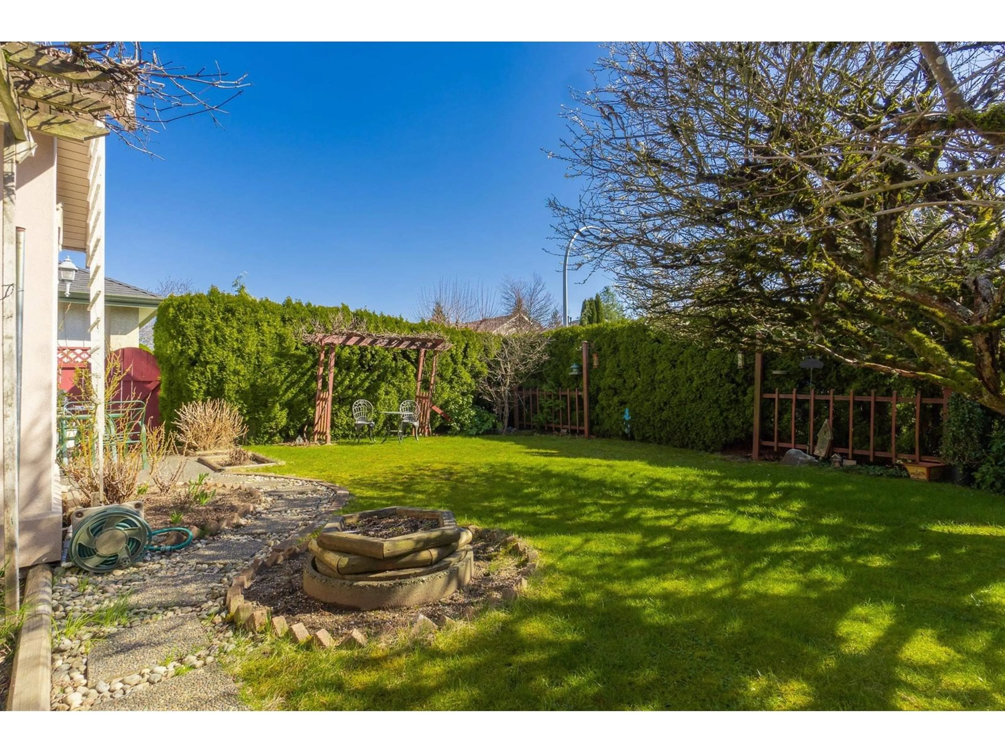 A pic from outside/outdoor area/front of a property/back of a property/a pic from drone, forest/trees view for 10970 155 STREET, Surrey British Columbia V3R0X6