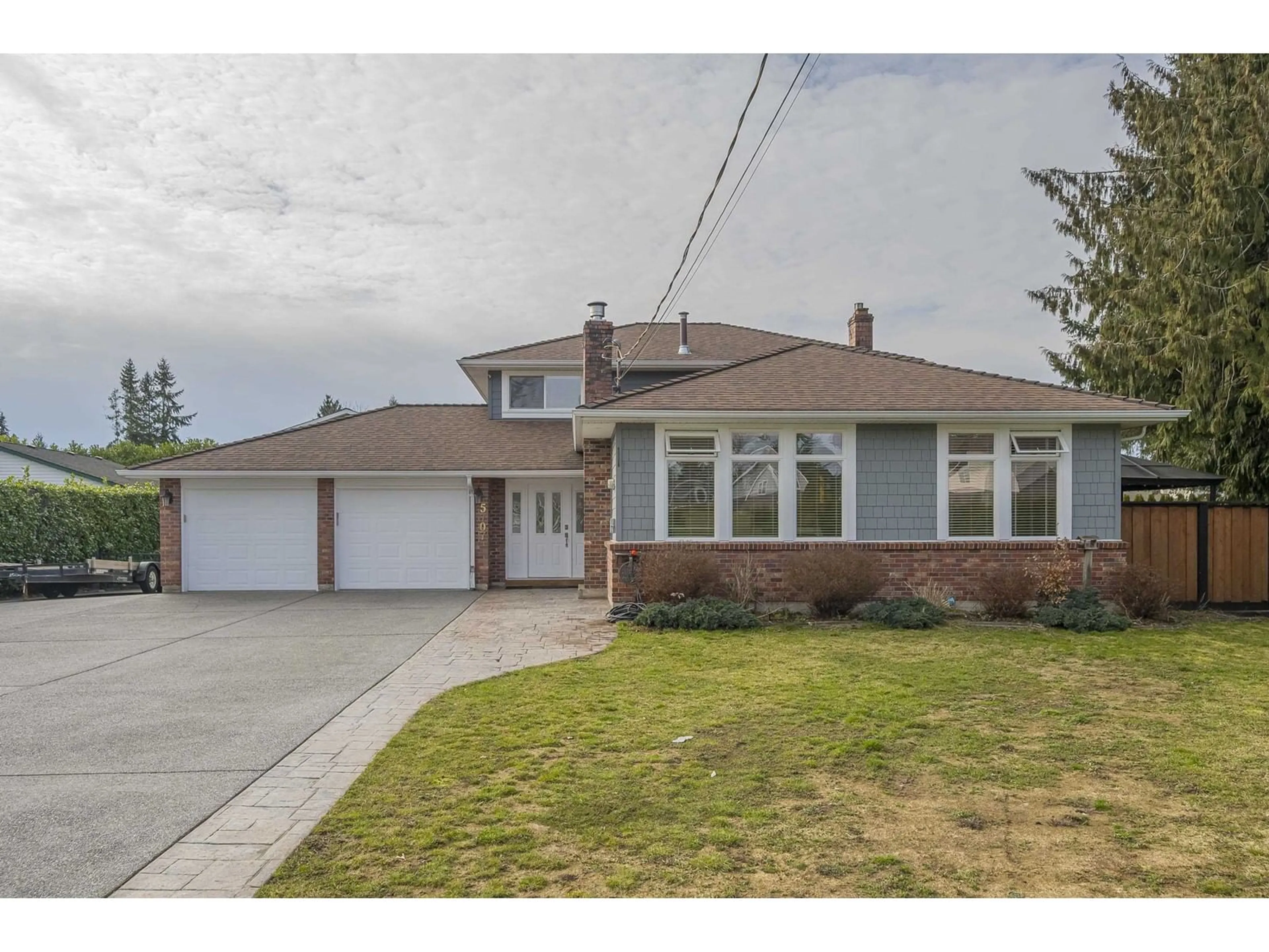 Home with brick exterior material, street for 5707 247A STREET, Langley British Columbia V2Z1H2