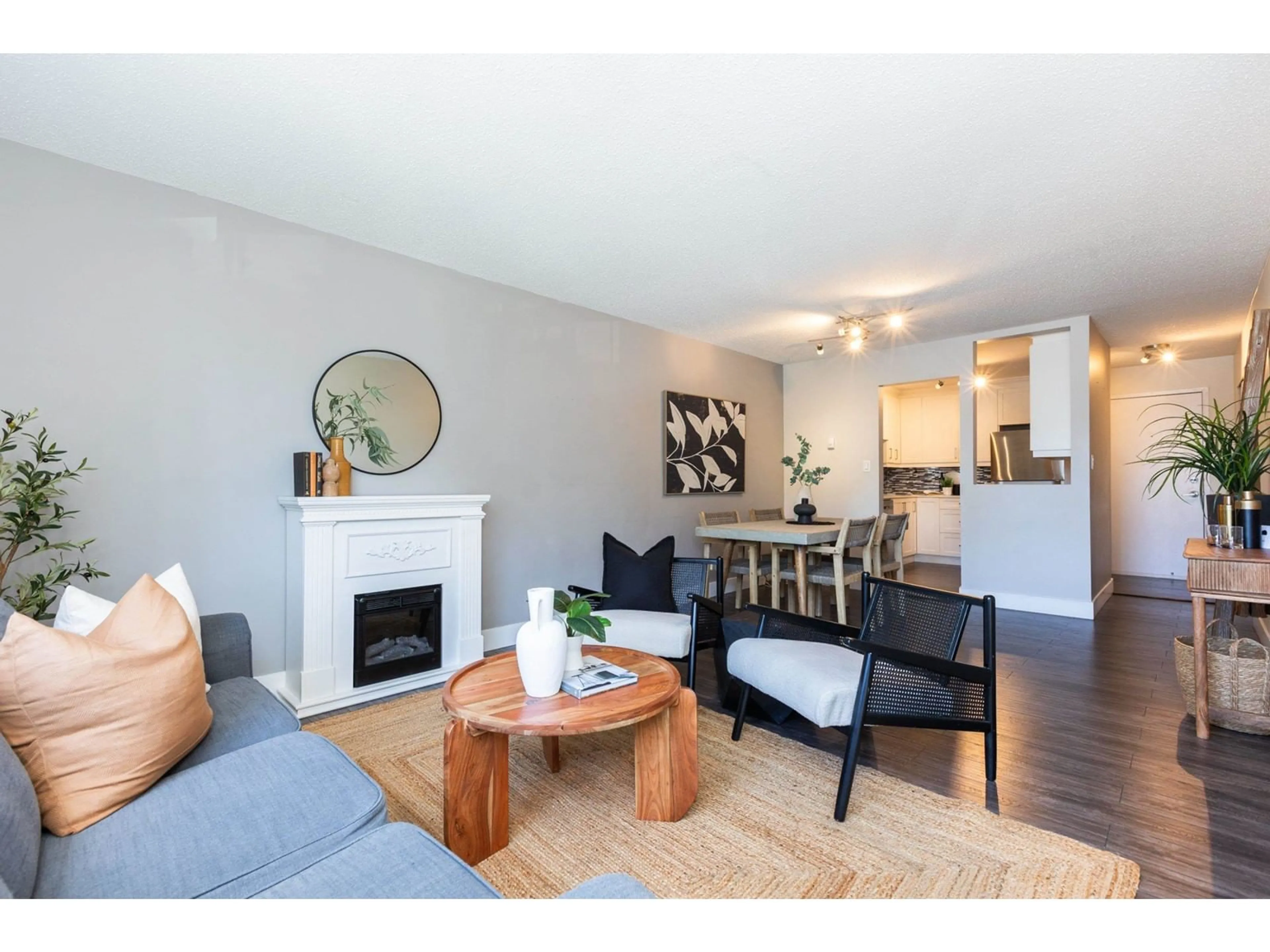 Living room with furniture, wood/laminate floor for 202 1526 GEORGE STREET, White Rock British Columbia V4B4A5