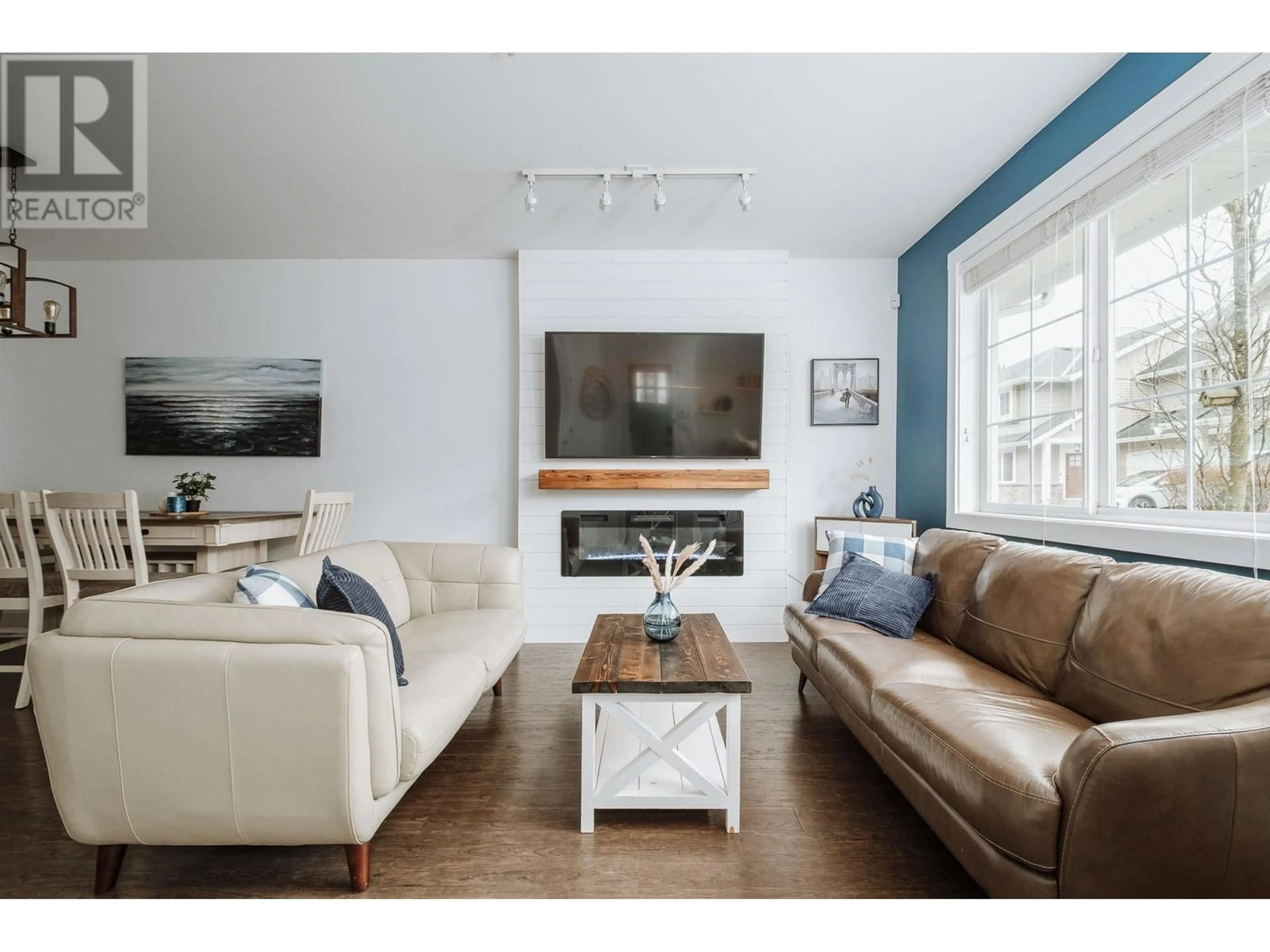 Living room with furniture, wood/laminate floor for 49 12161 237 STREET, Maple Ridge British Columbia V4R0E7