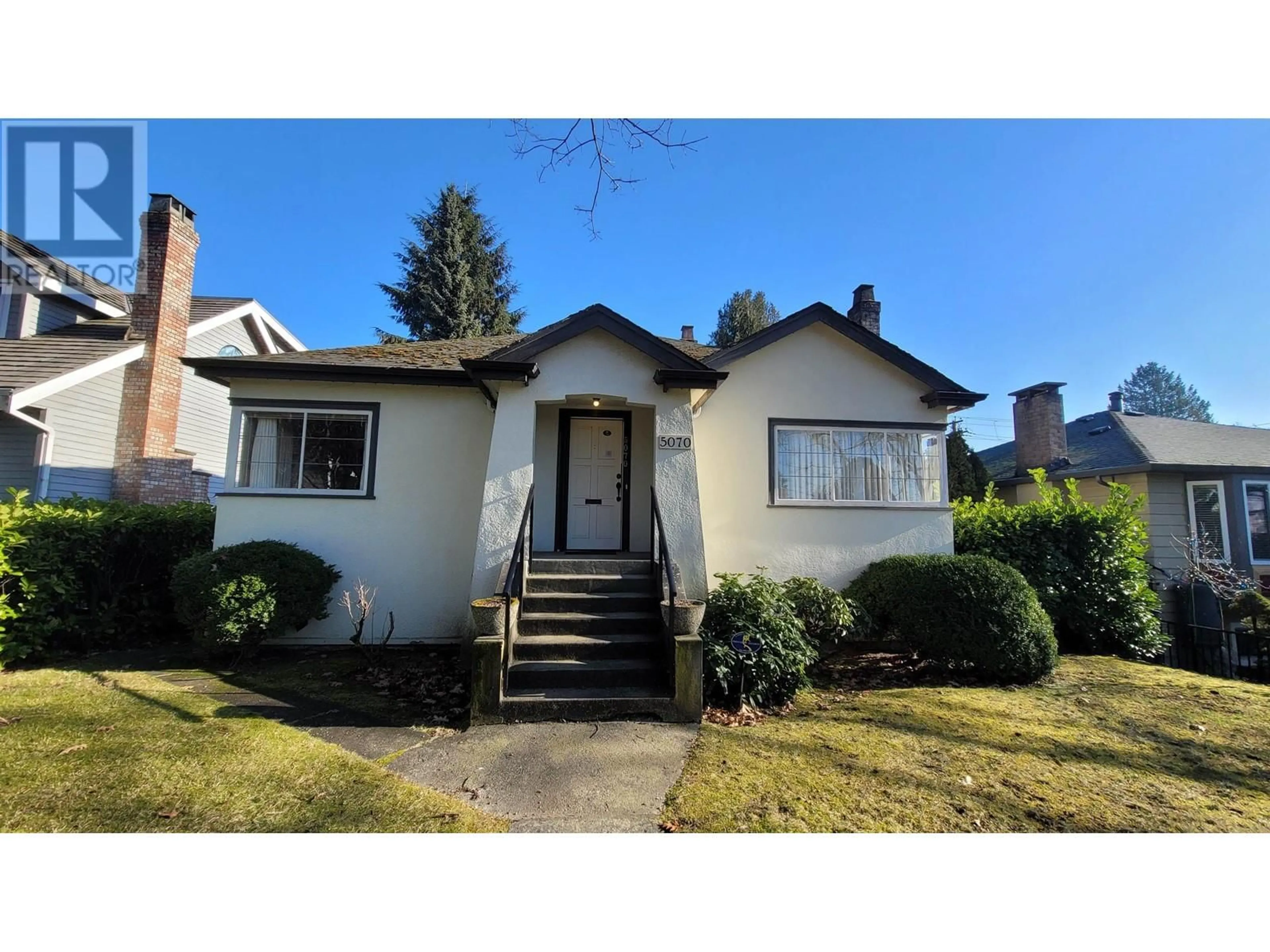 Home with vinyl exterior material, street for 5070 BLENHEIM STREET, Vancouver British Columbia V6N1N5