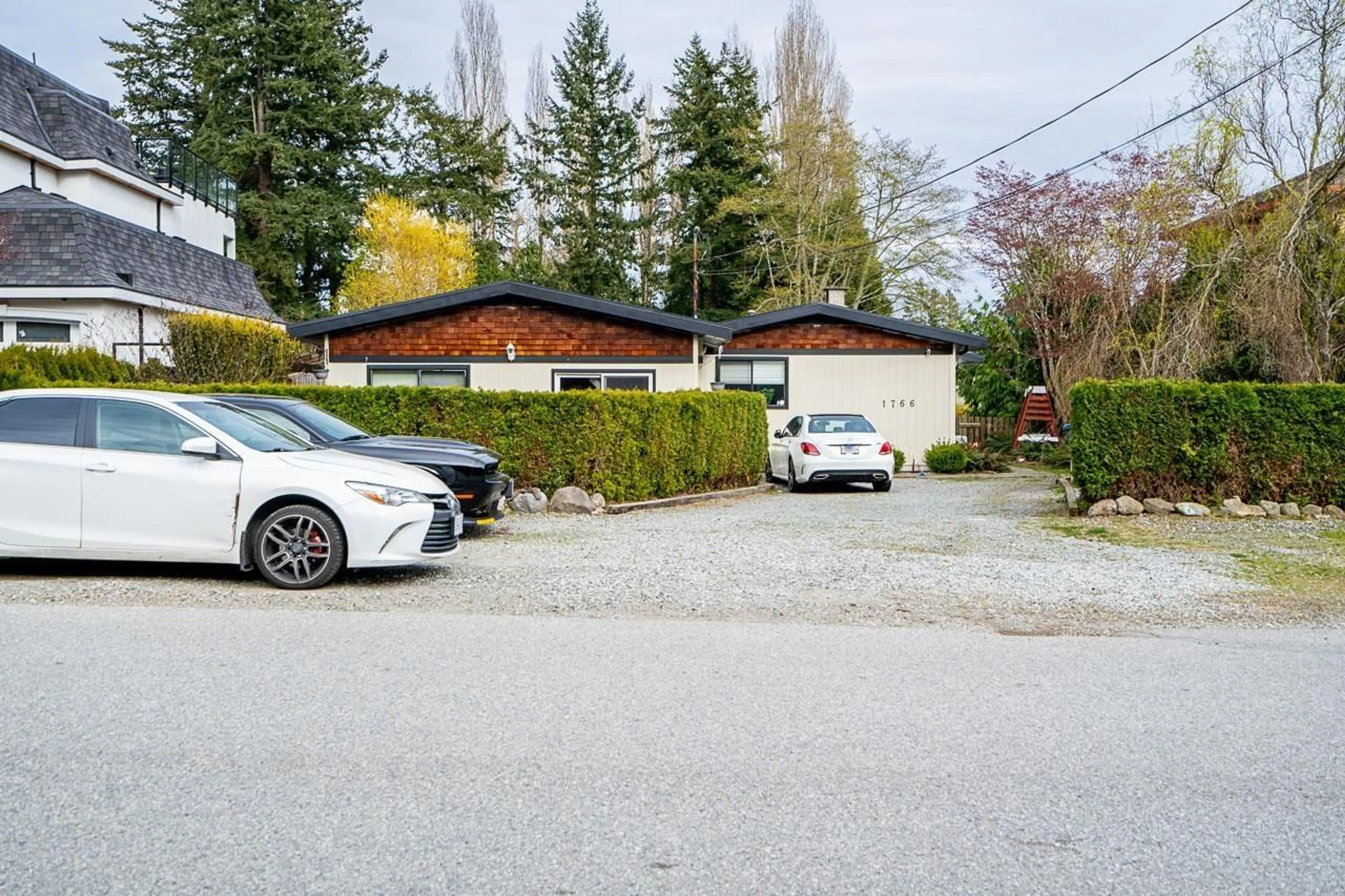 A pic from outside/outdoor area/front of a property/back of a property/a pic from drone, street for 1766 139 STREET, Surrey British Columbia V4A4G7