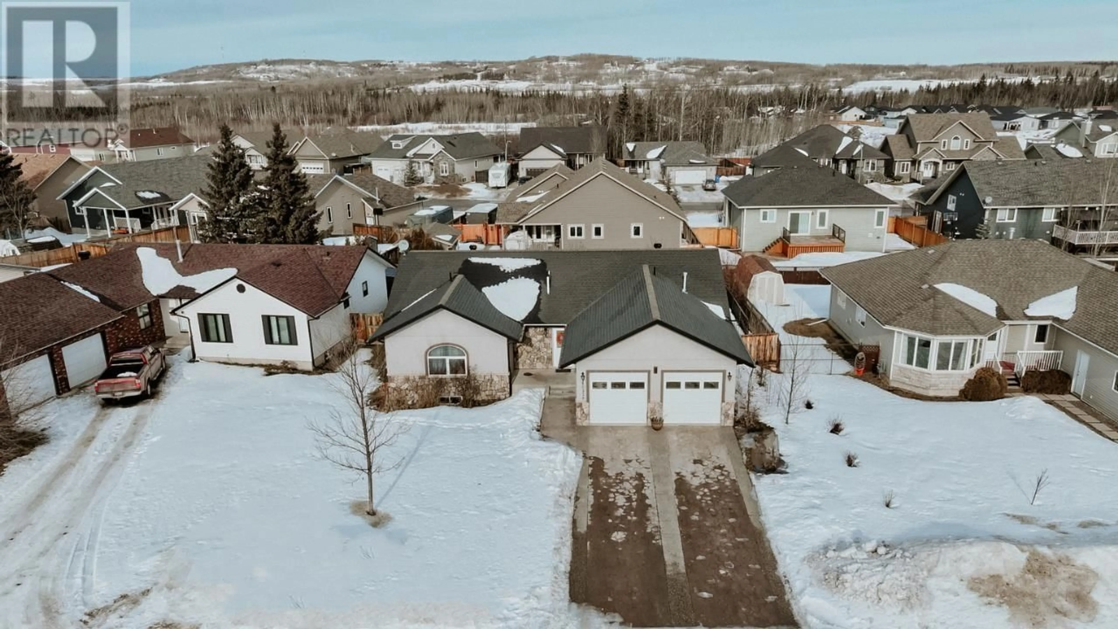 A pic from outside/outdoor area/front of a property/back of a property/a pic from drone, street for 10328 114 AVENUE, Fort St. John British Columbia V1J0C6