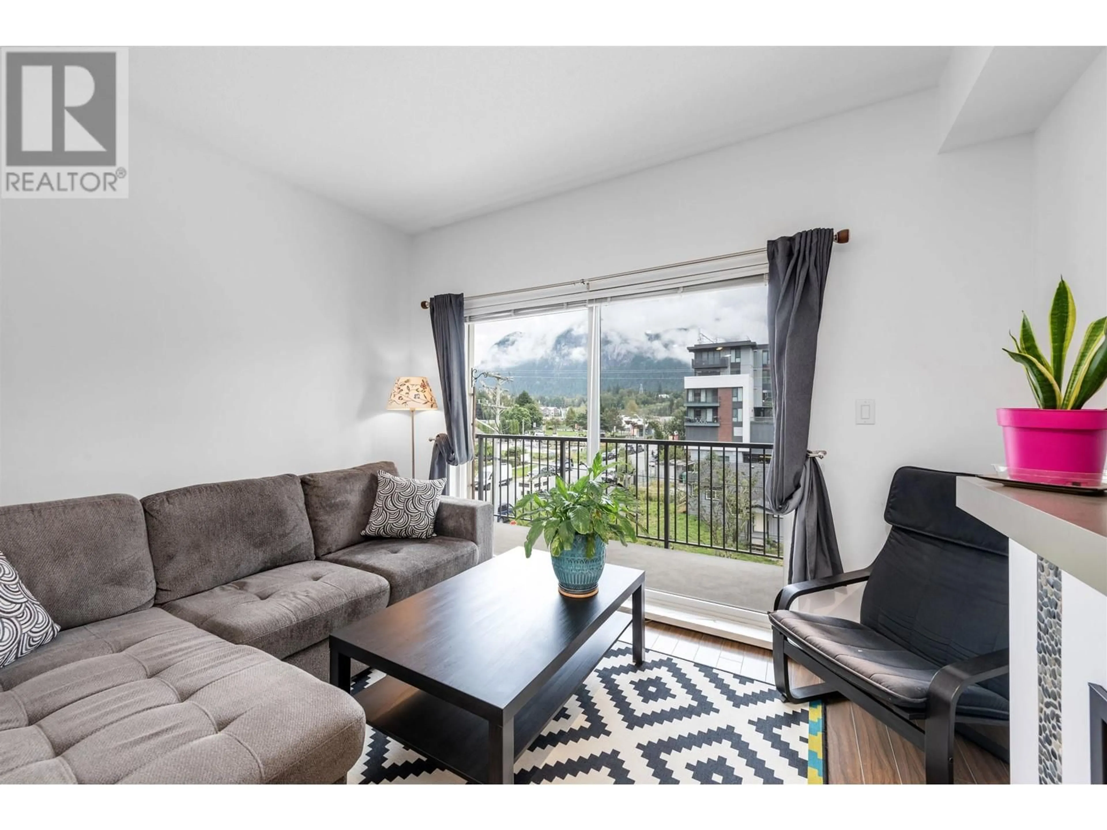 Living room with furniture, wood/laminate floor for 309 1336 MAIN STREET, Squamish British Columbia V8B0R2