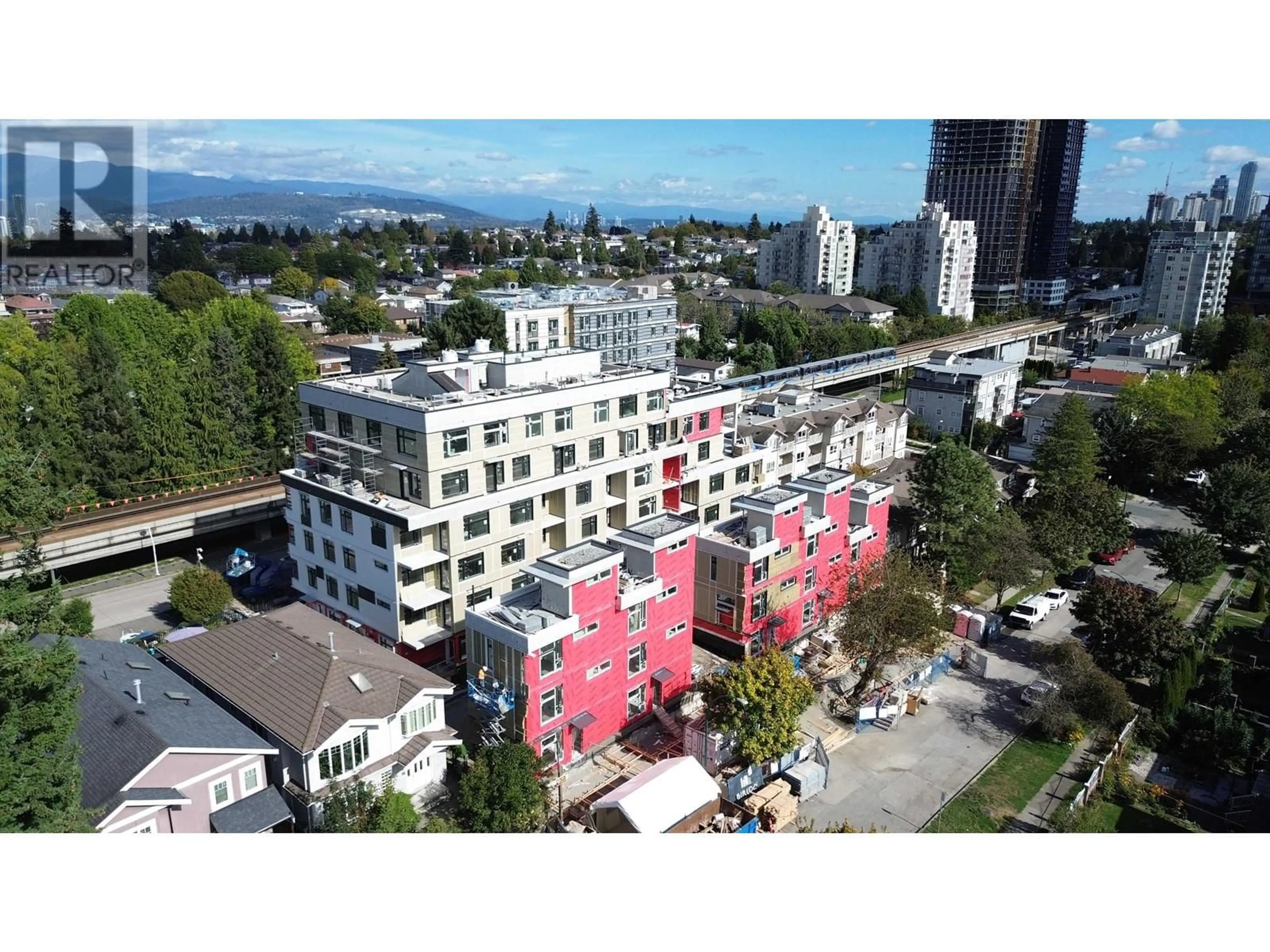 A pic from outside/outdoor area/front of a property/back of a property/a pic from drone, city buildings view from balcony for 405 3264 VANNESS AVENUE, Vancouver British Columbia V5R4V3