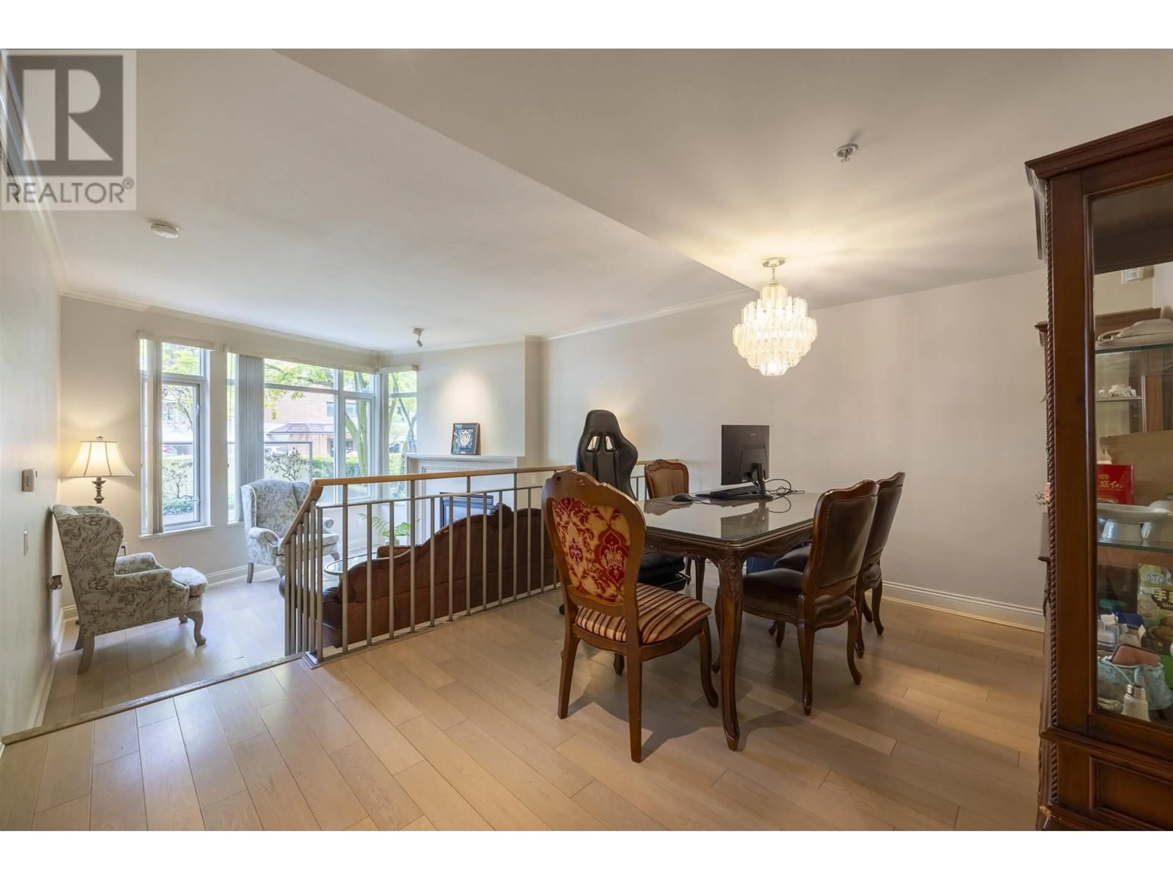 Dining room, wood/laminate floor for 205 638 W 45TH AVE, Vancouver British Columbia V5Z4R8