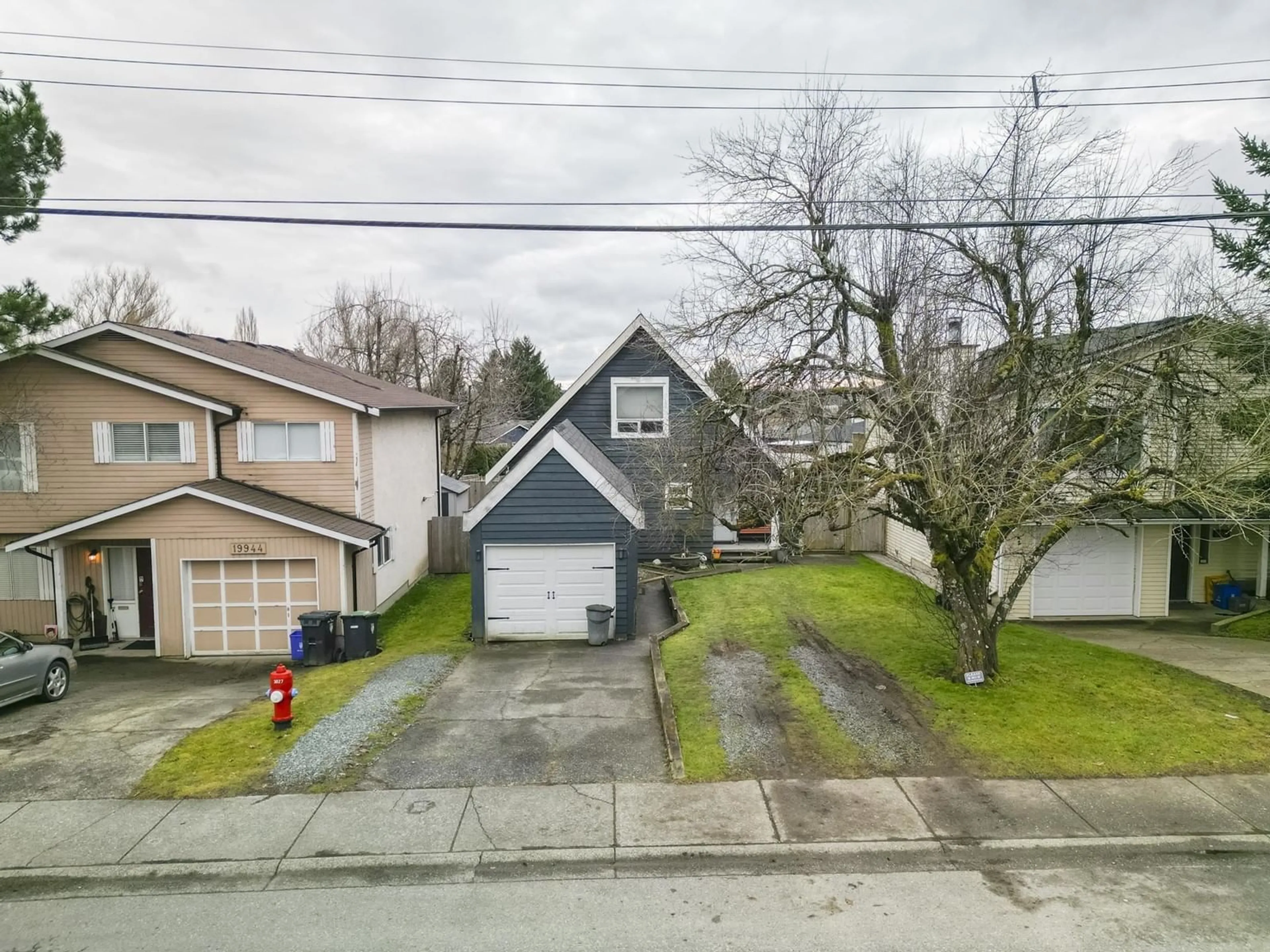 A pic from outside/outdoor area/front of a property/back of a property/a pic from drone, street for 19936 68, Langley British Columbia V2Y1H8