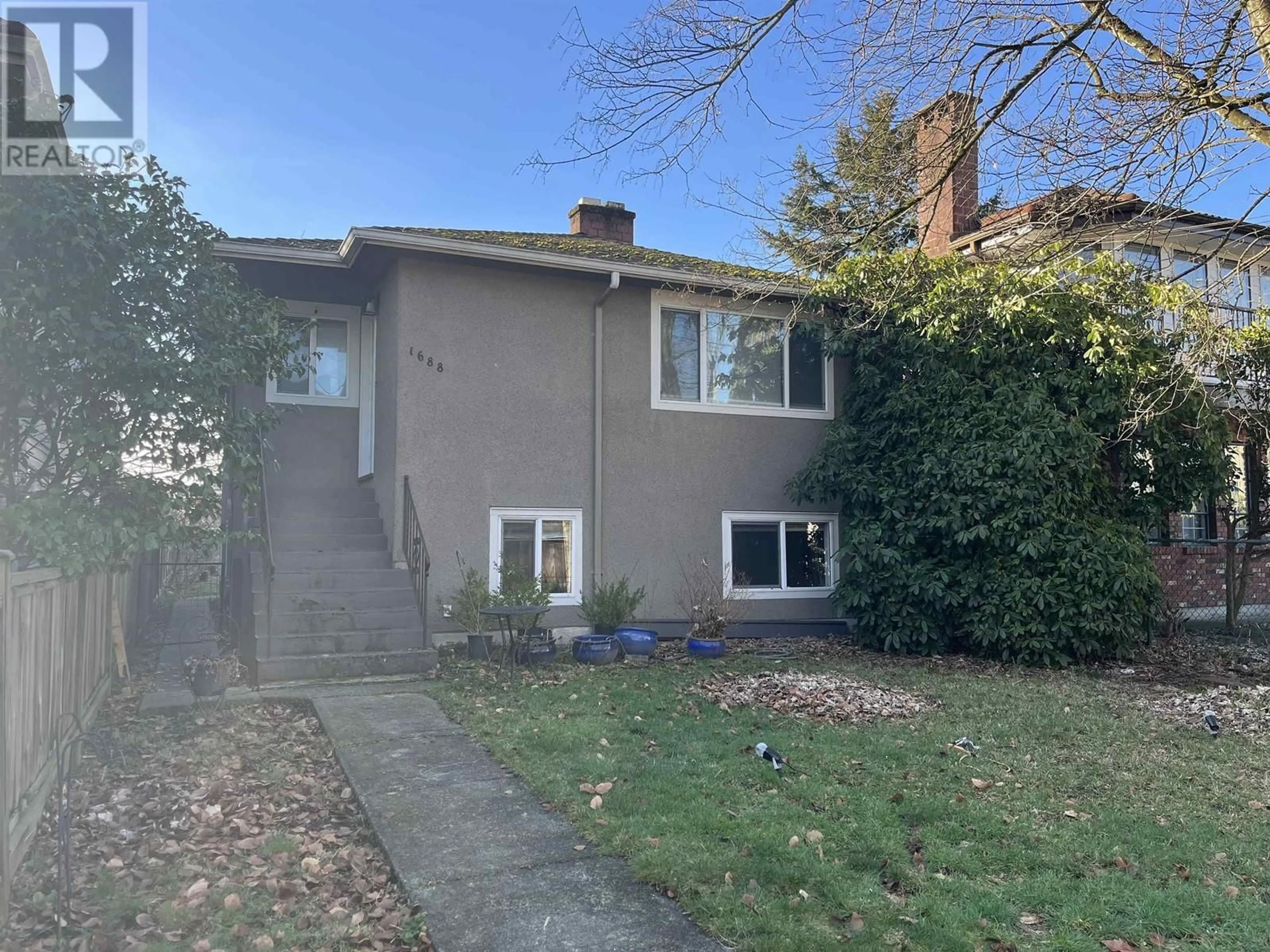 A pic from outside/outdoor area/front of a property/back of a property/a pic from drone, street for 1688 E 29TH AVENUE, Vancouver British Columbia V5N2Y6