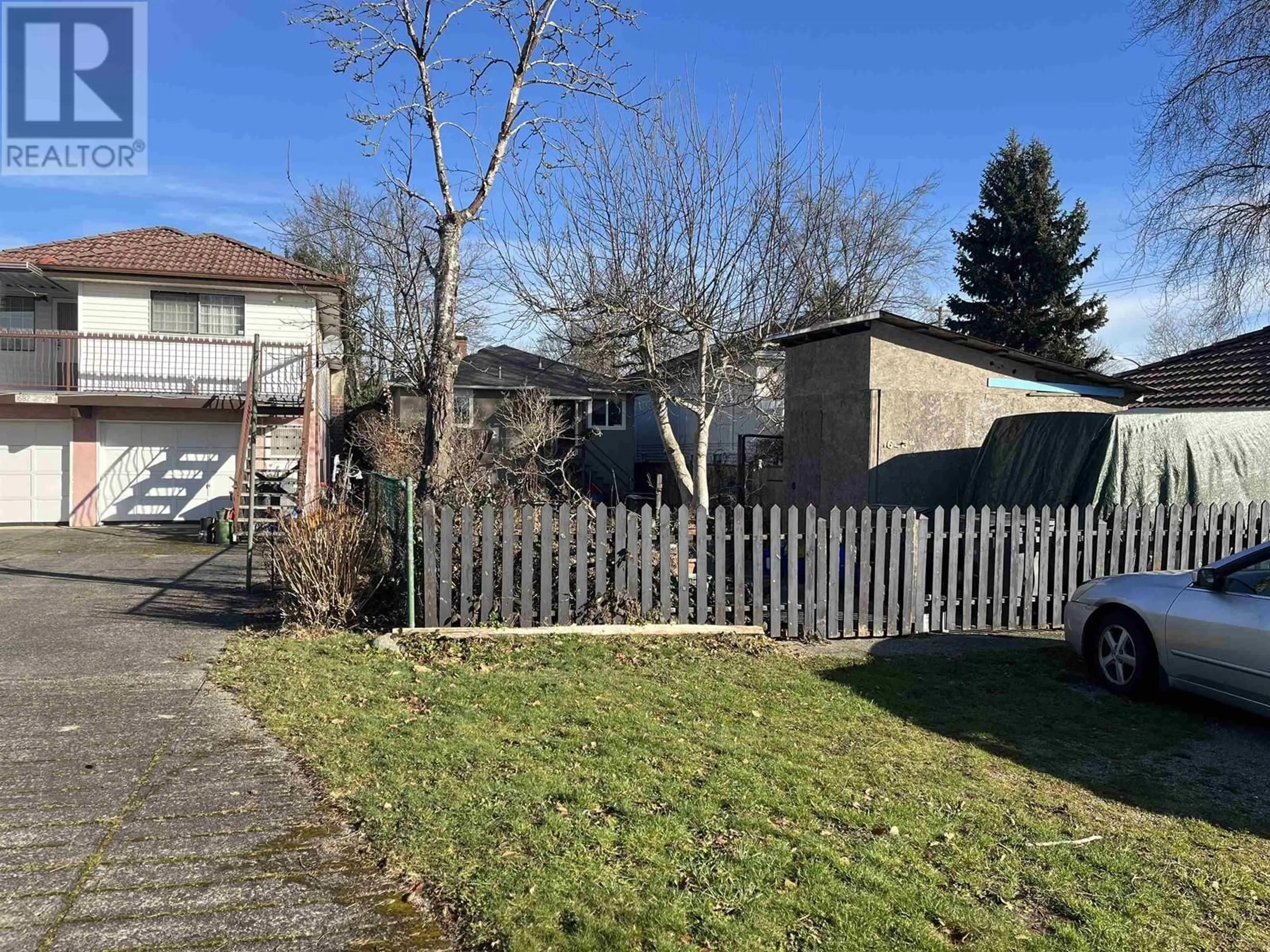 A pic from outside/outdoor area/front of a property/back of a property/a pic from drone, street for 1688 E 29TH AVENUE, Vancouver British Columbia V5N2Y6