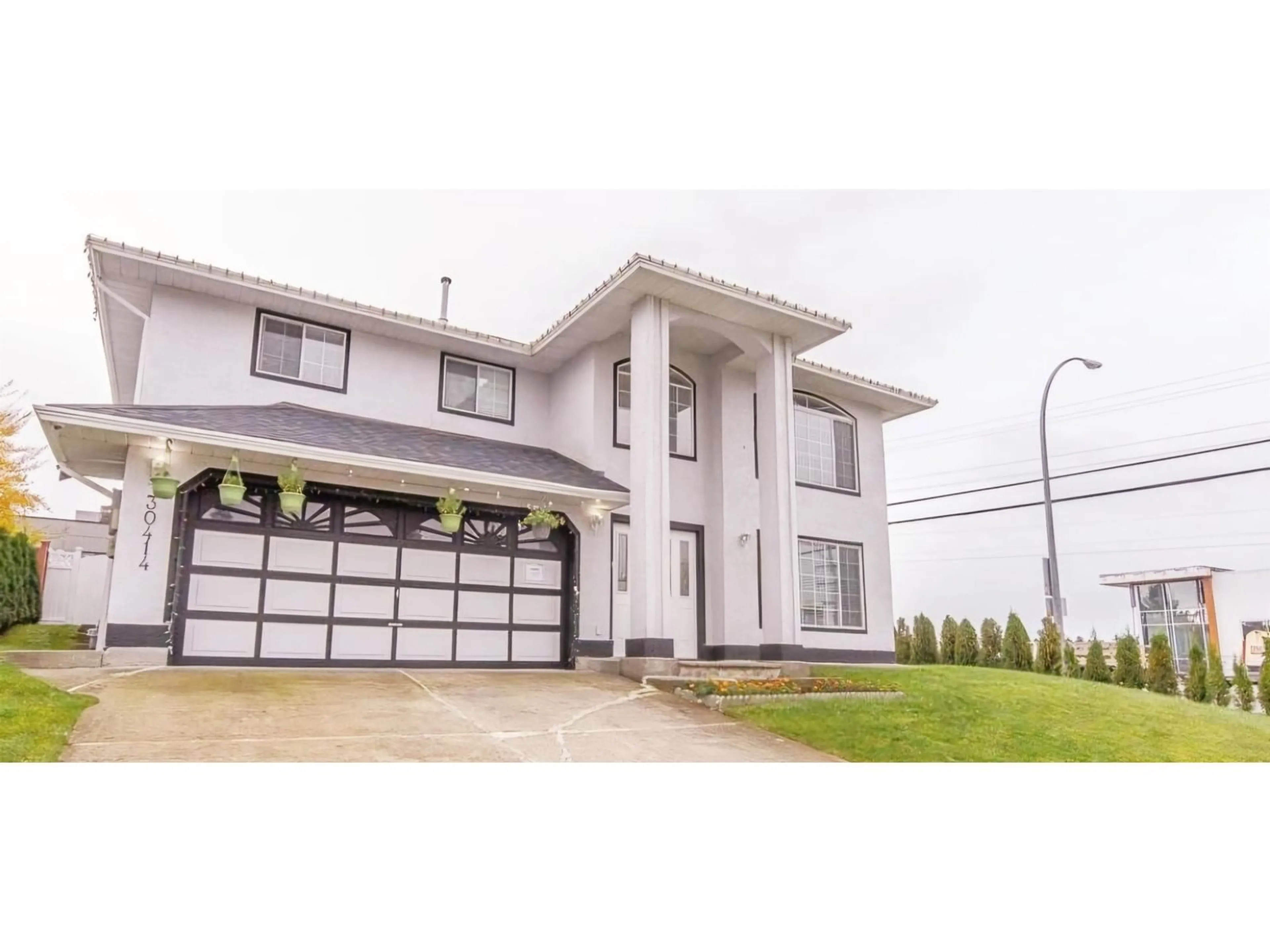 Home with vinyl exterior material, street for 30414 SANDPIPER, Abbotsford British Columbia V2T5N2