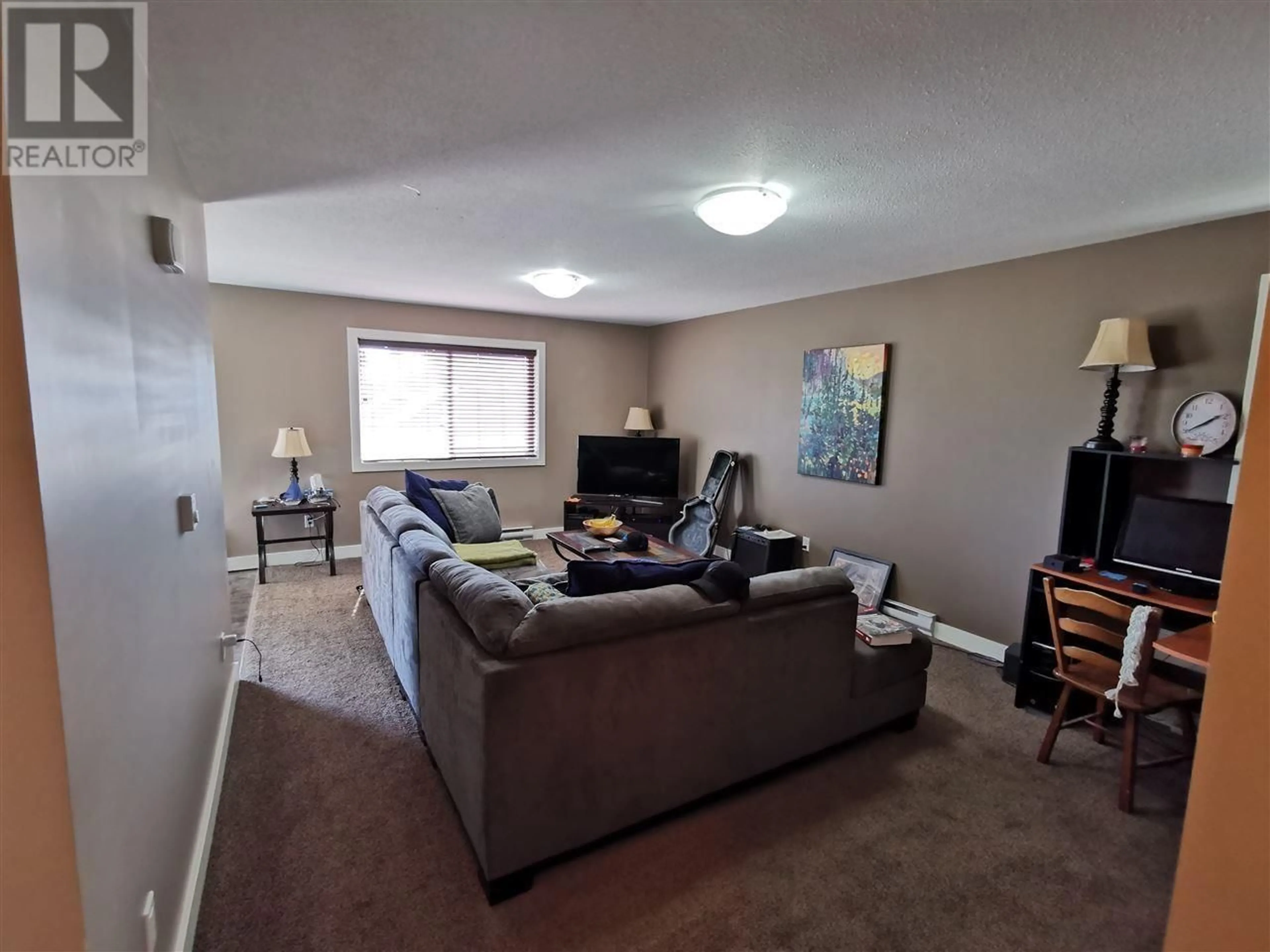 Living room with furniture, unknown for 4 10220 97 AVENUE, Fort St. John British Columbia V1J0B1