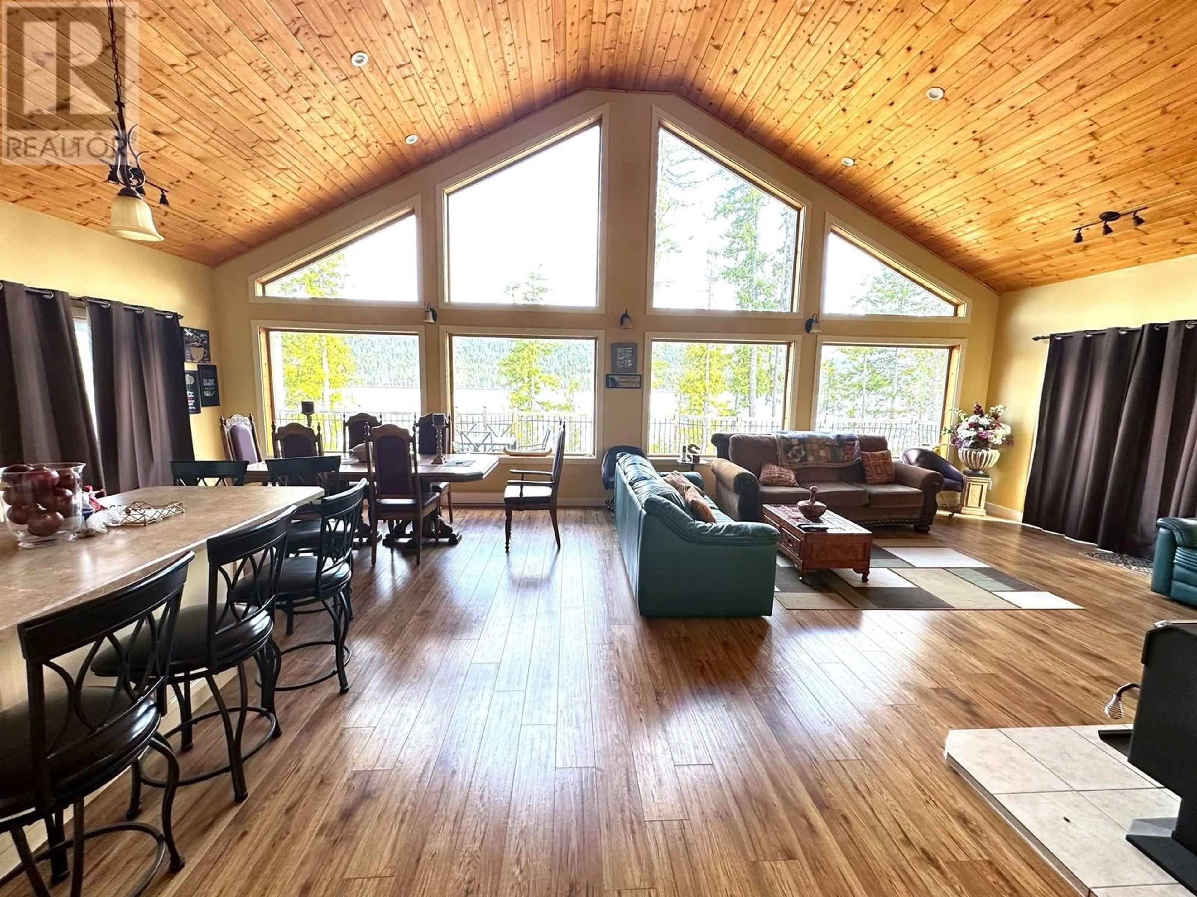 Living room with furniture, wood/laminate floor for 9019 MAHOOD LAKE ROAD, Mahood Lake British Columbia V0K1X3