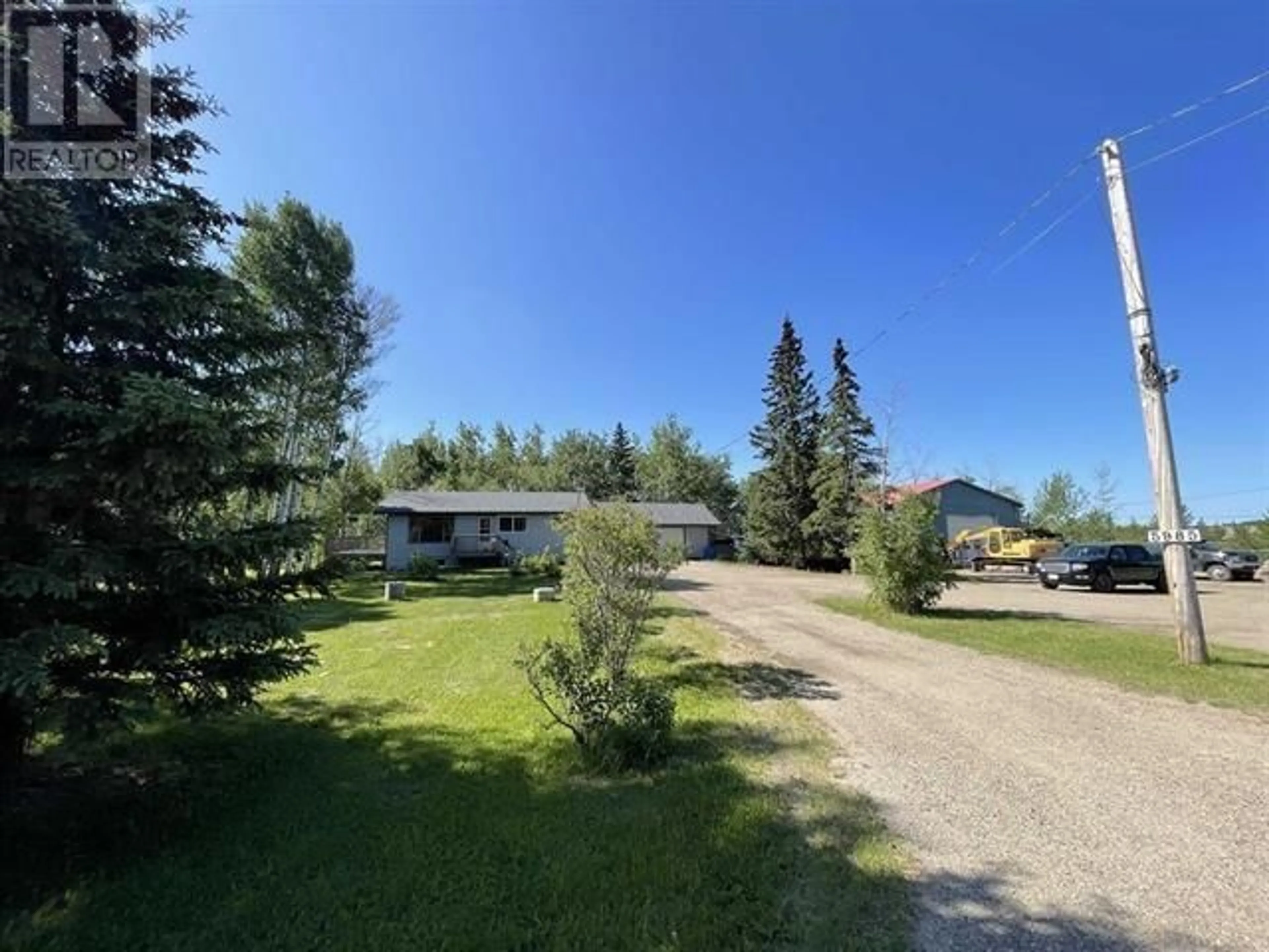 A pic from outside/outdoor area/front of a property/back of a property/a pic from drone, unknown for 5985 JADE ROAD, Fort St. John British Columbia V0C2K0