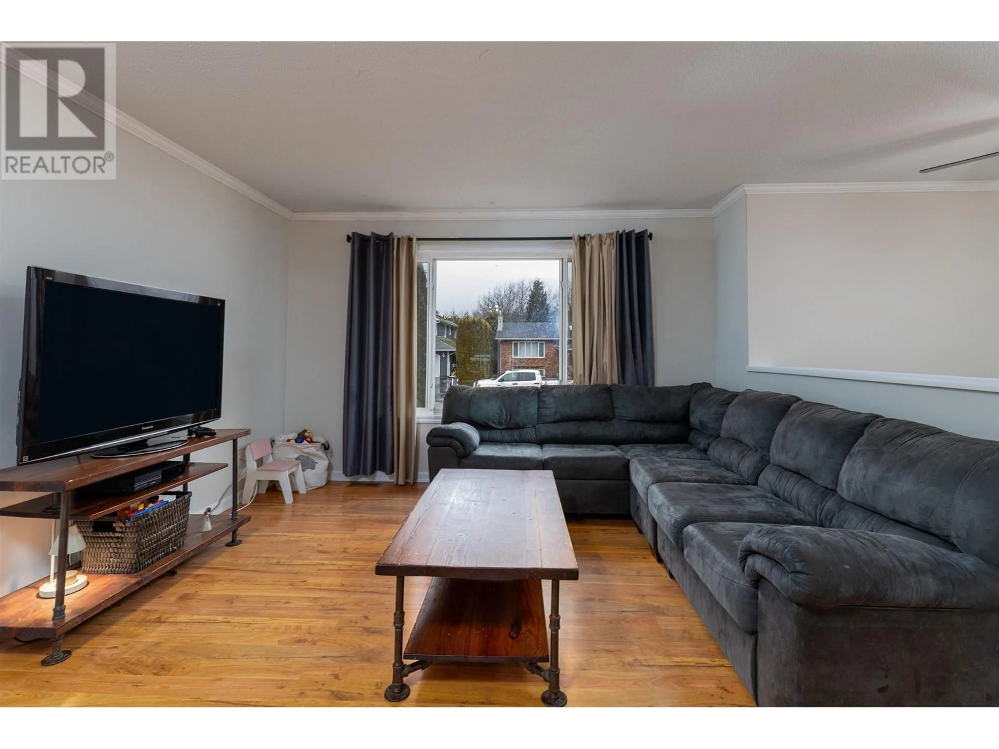 Living room with furniture, wood/laminate floor for 3804 DEJONG CRESCENT, Terrace British Columbia V8G4W6