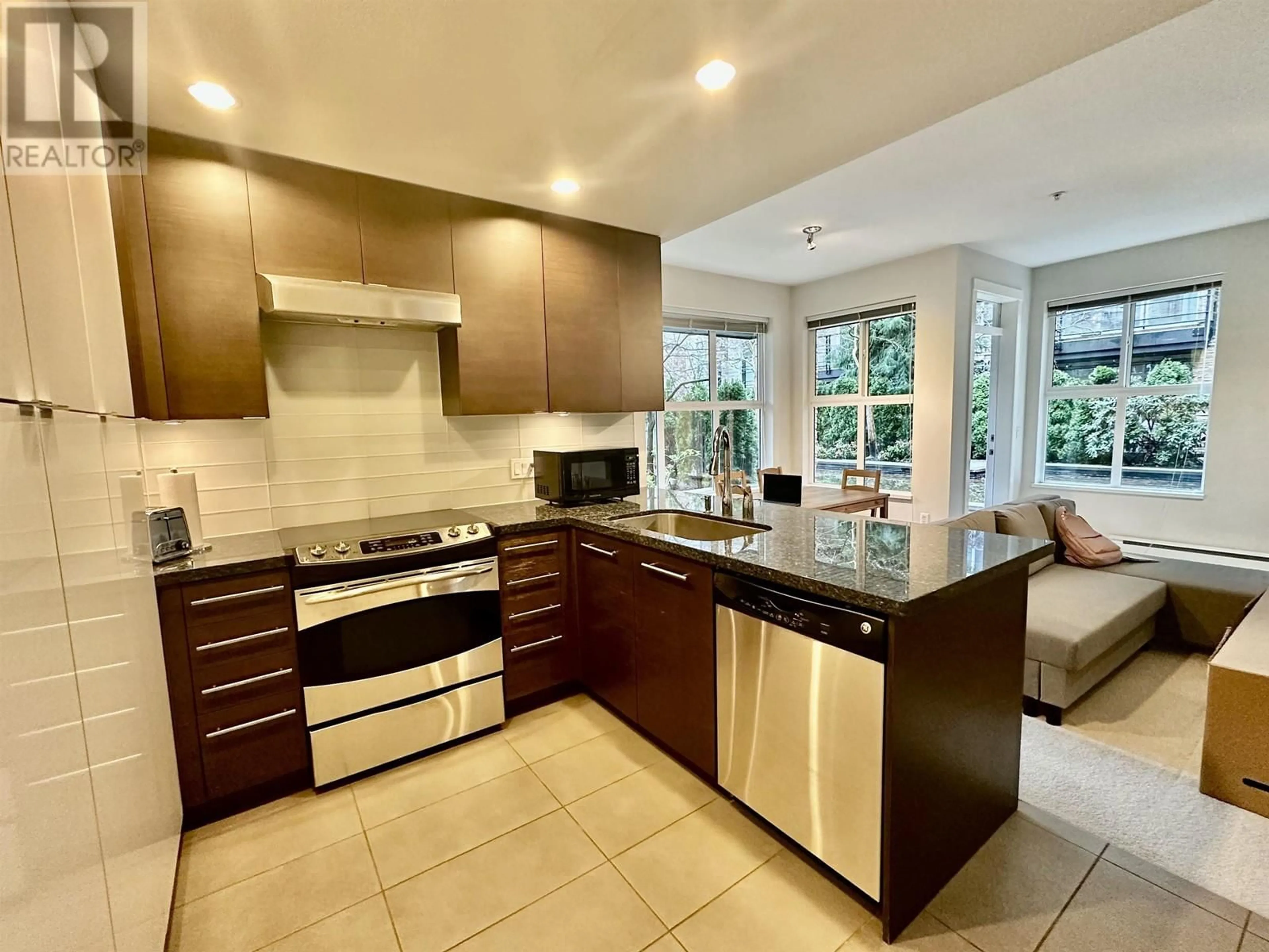 Open concept kitchen, ceramic/tile floor for 126 - 5928 BIRNEY AVENUE, Vancouver British Columbia V6S0B5