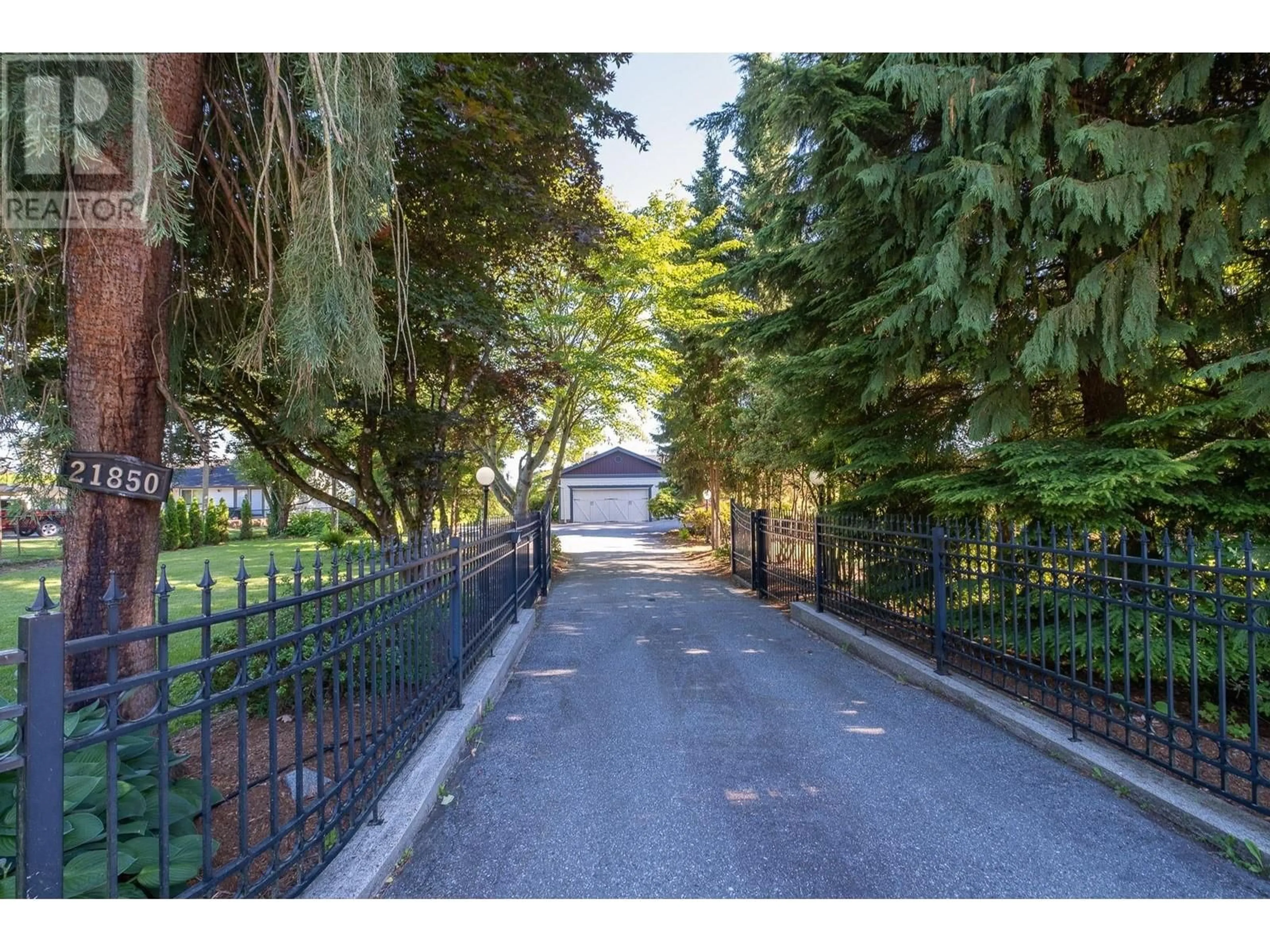 A pic from outside/outdoor area/front of a property/back of a property/a pic from drone, street for 21850 RIVER ROAD, Maple Ridge British Columbia V2X2C1